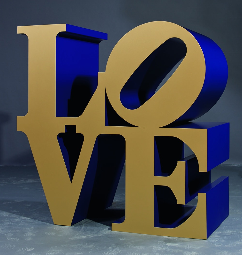 Monumental sculpture of the word Love in Blue and Gold by Robert Indiana