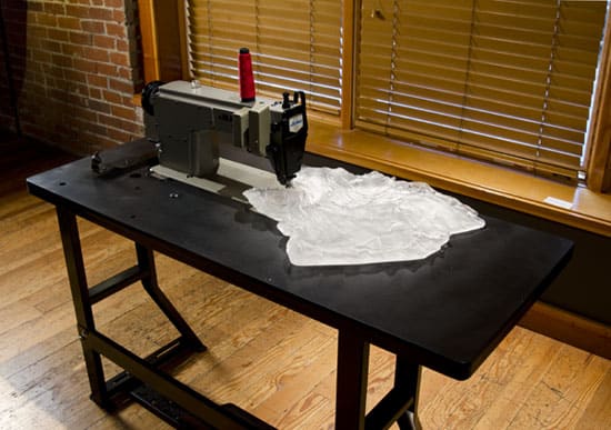 Cassandra Straubing, The Seamstress Sets The Seam Of A Hand Pleated Garment., 2014