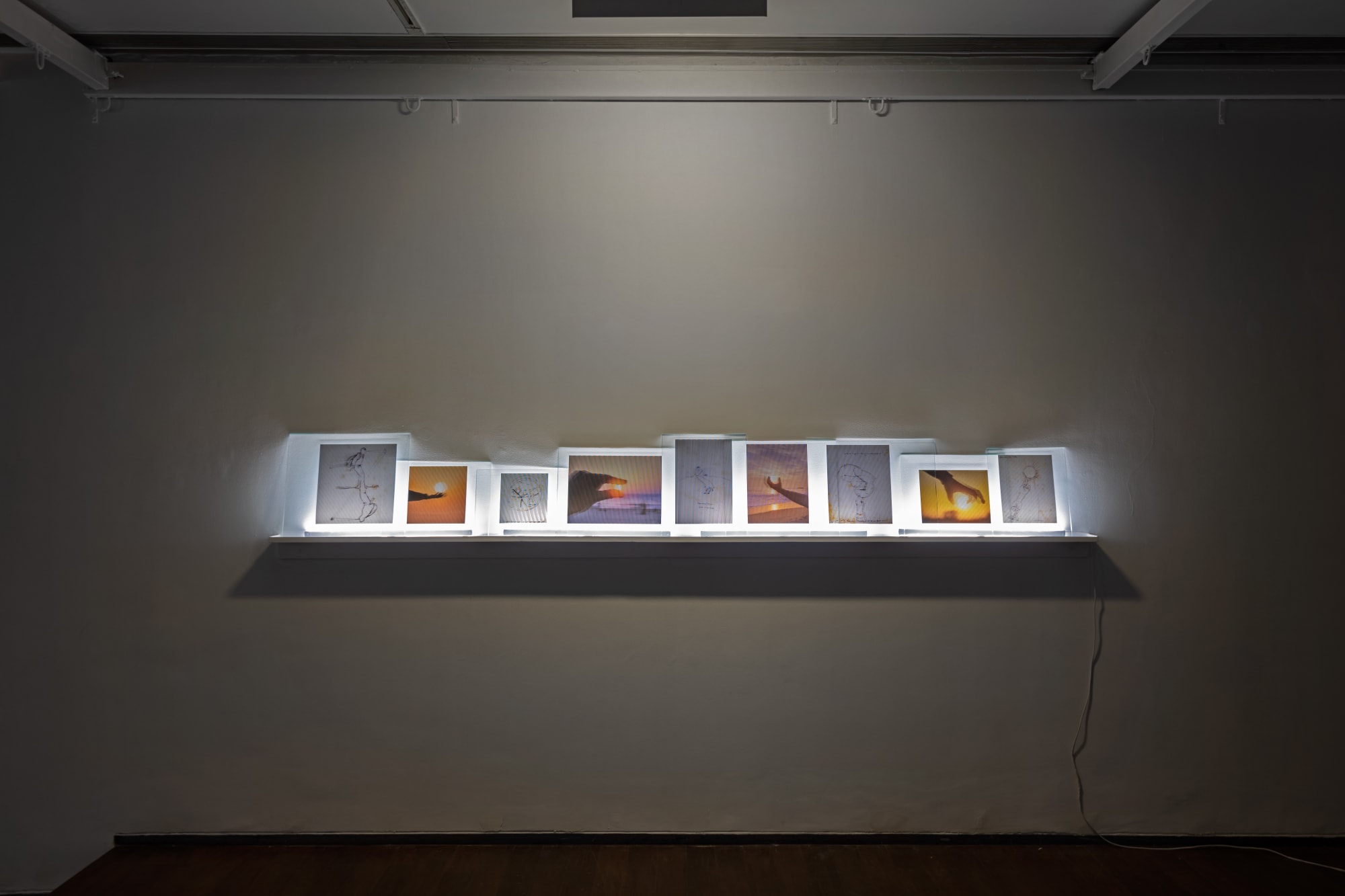 Jitish Kallat Otherwhile, 2022 Parallax barrier multi-scopic prints on glass, LED tubes 115 x 15.5 in 292.1 x 39.4 cm Edition of 3