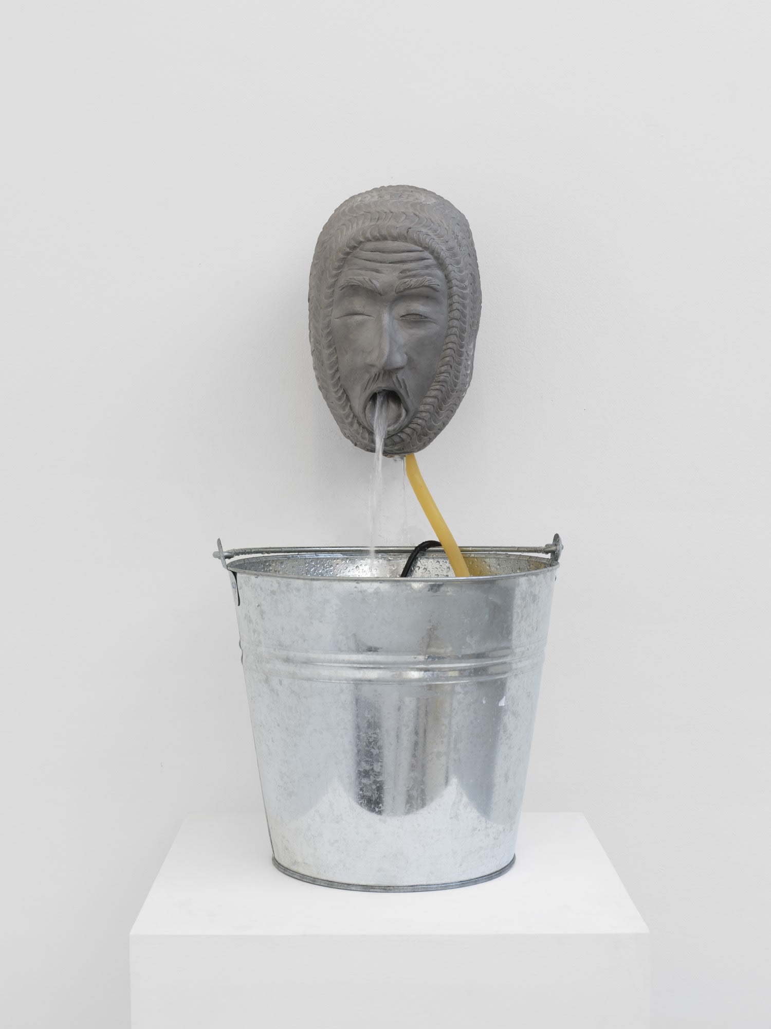 Dominic Watson, ‘From the Land of Milk and Honey’, 2023, Aluminium Head, Steel Bucket, water pump, Cider, 24 x 30 x 20 cm. © The artist courtesy of Cob Gallery.