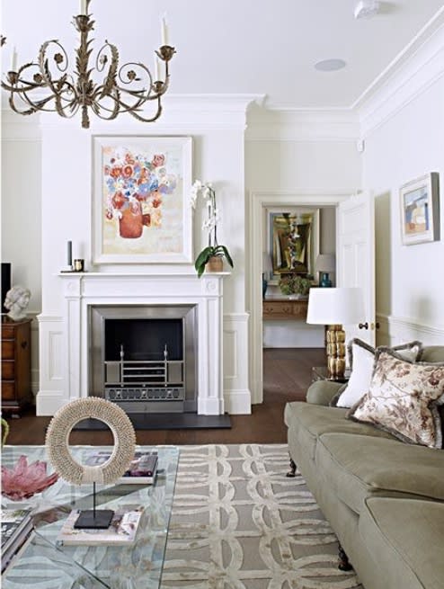 A still life by Bridget Lansley, bringing a pop of colour above a fireplace.