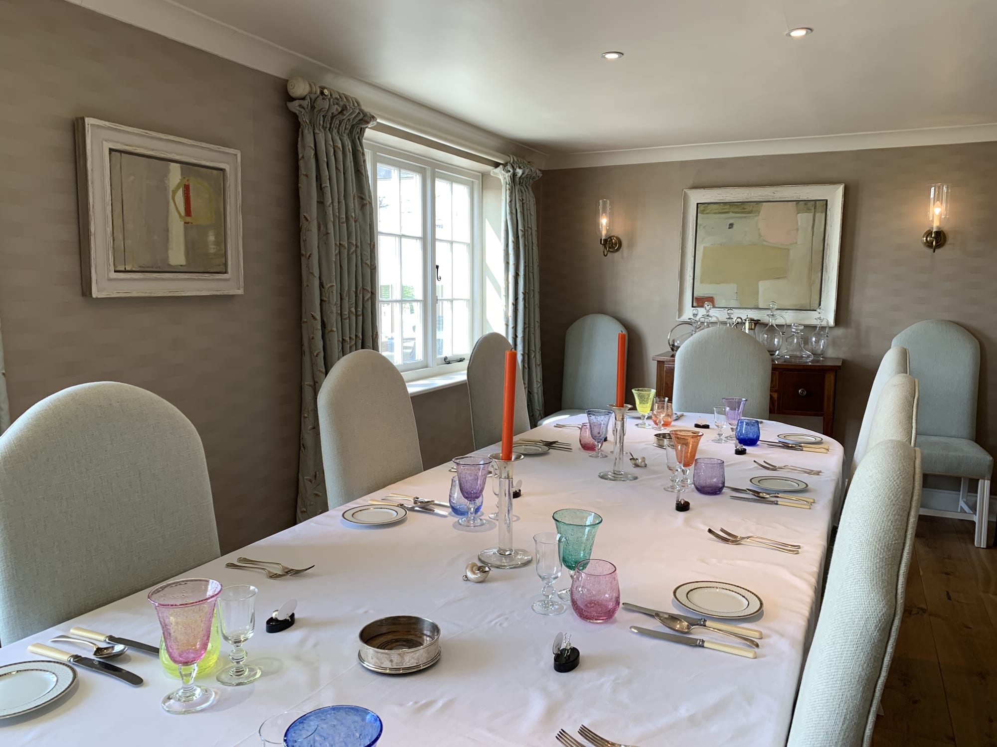 Two paintings by Chloe Lamb in a client's dining room.