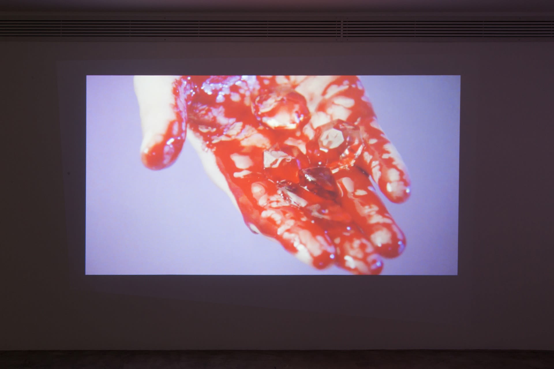 Installation View of Shimmers a solo Installation of Video Works by Isabelle Cornaro.