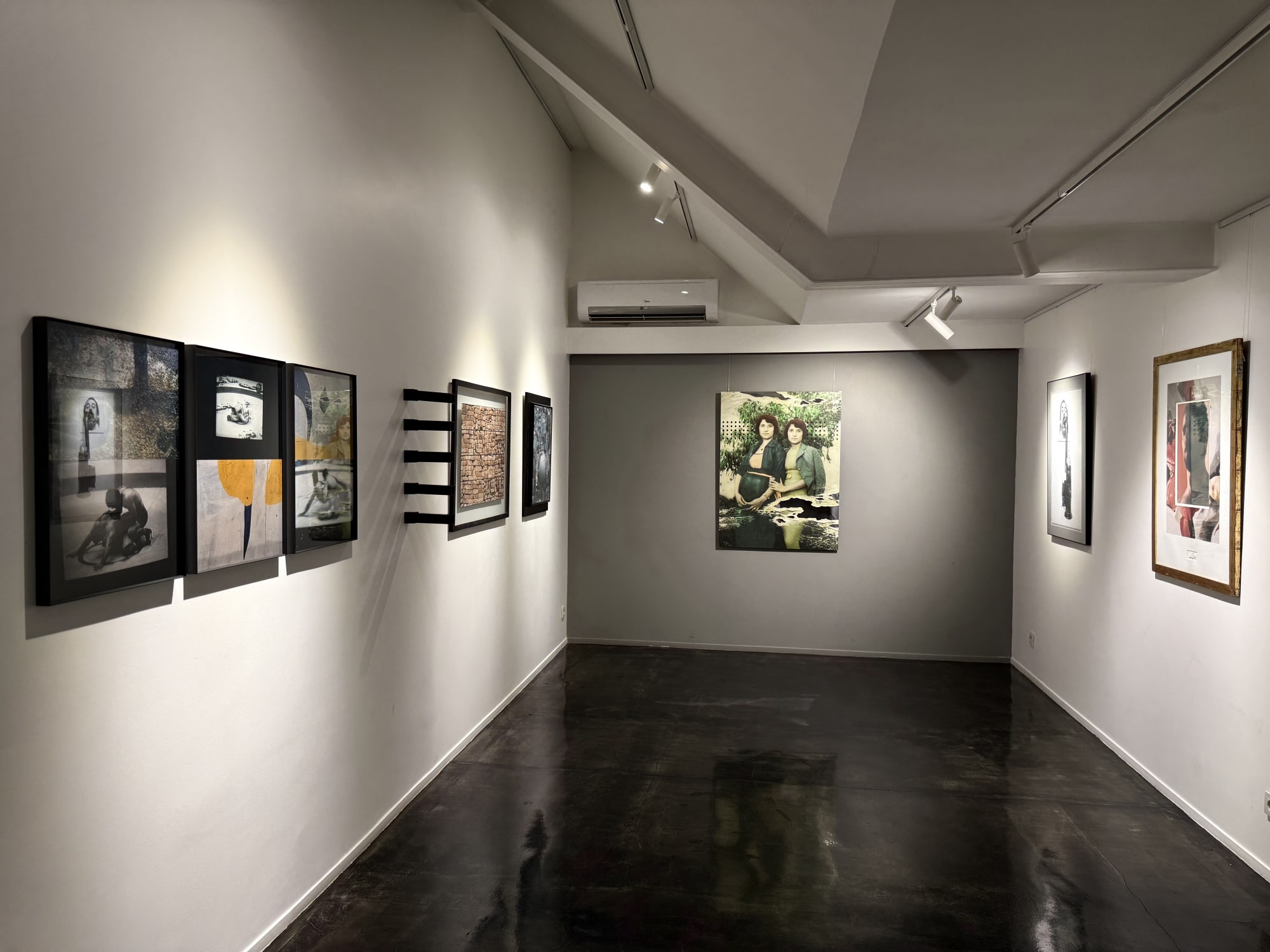 Installation View of a group photography exhibition of works Curated by Alborz Kazemi at E1 Art Gallery.
