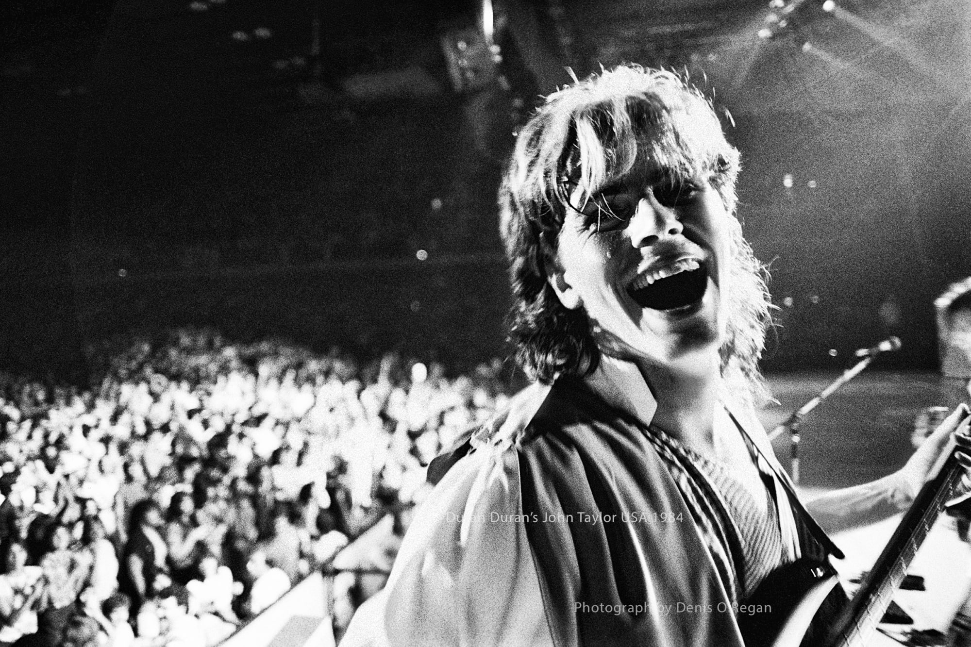 John Taylor happy on stage USA 1984