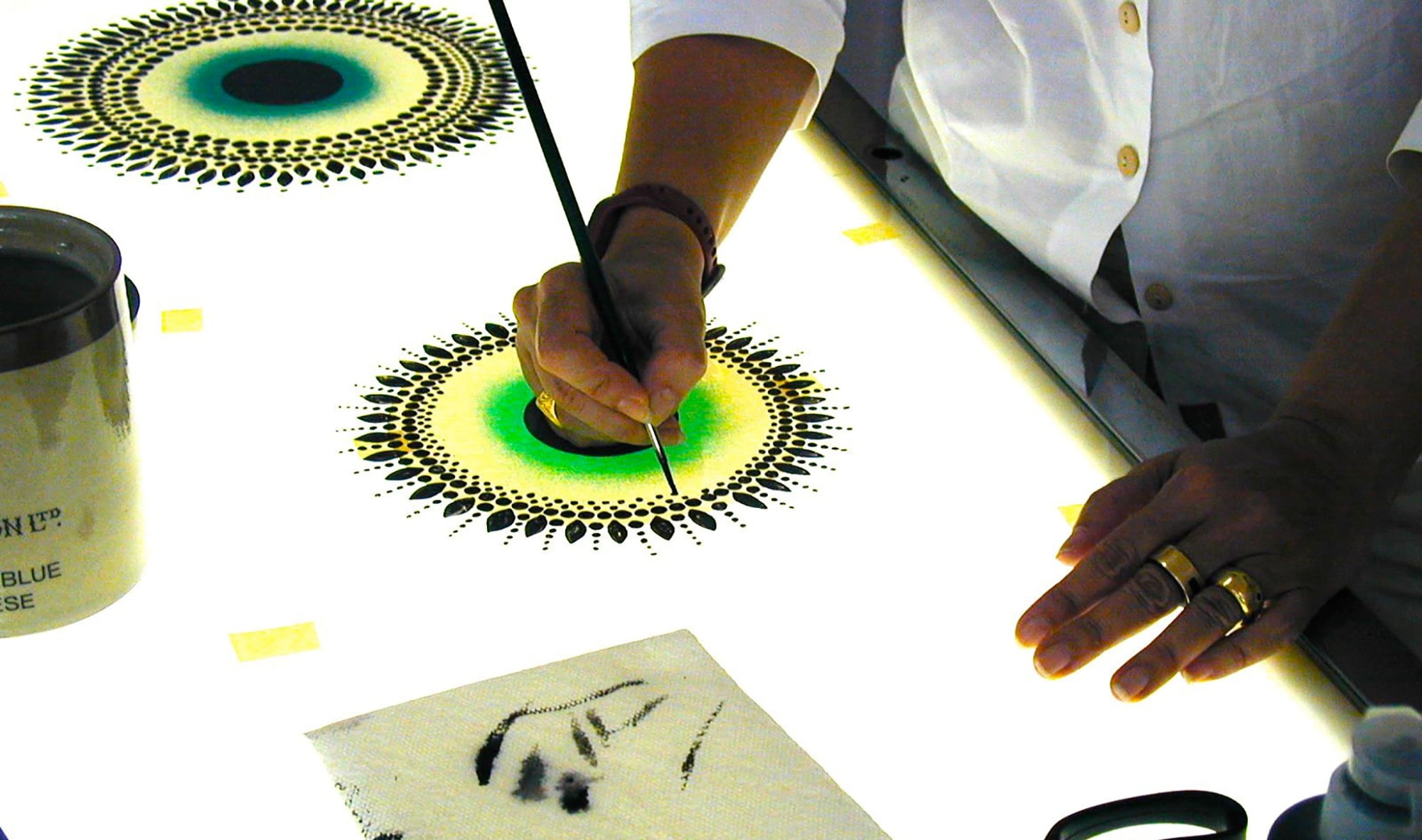 Beatriz Milhazes painting acetates for screenprint at durham press
