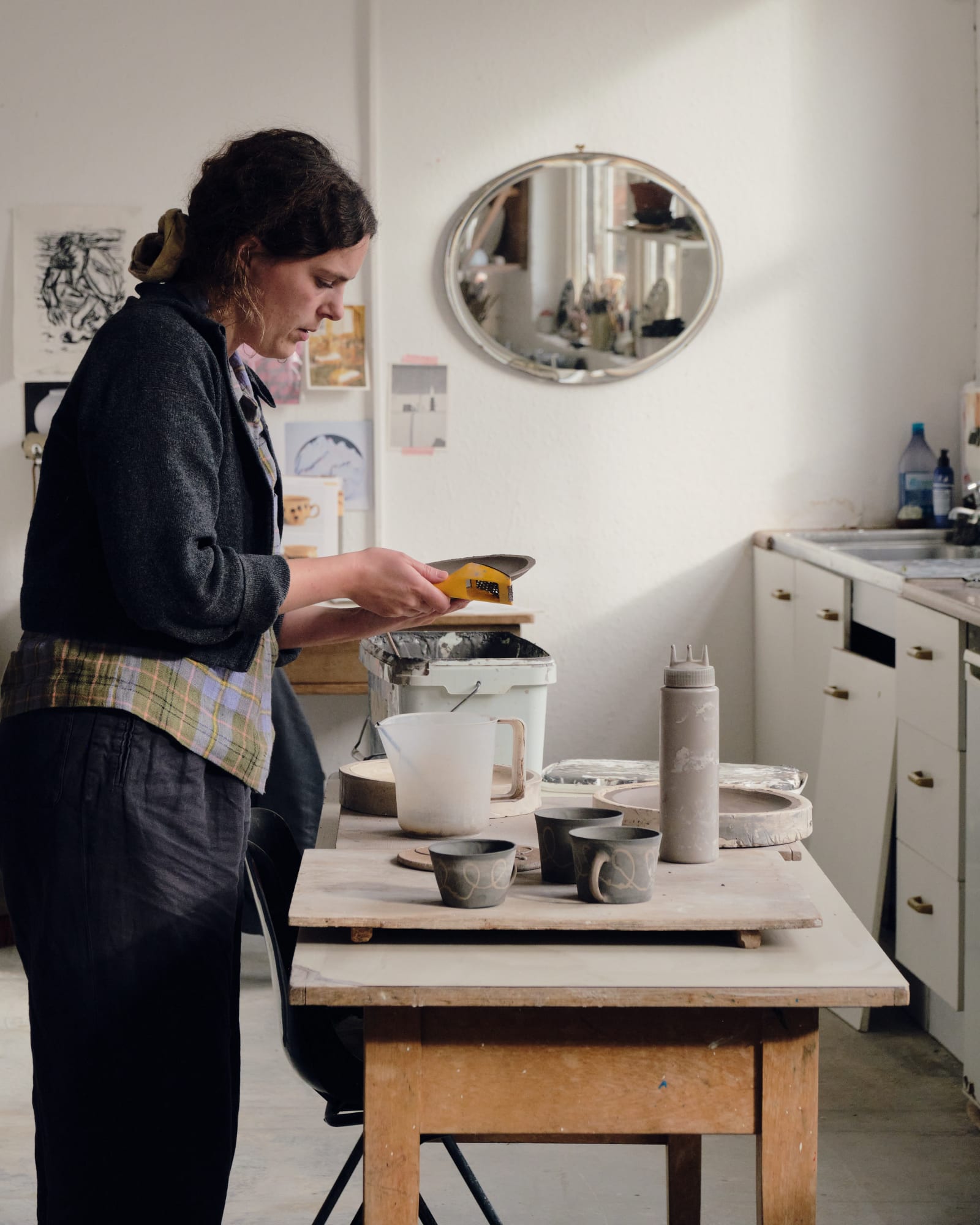 Ali uses her secret yellow grater that's perfect for tidying edges