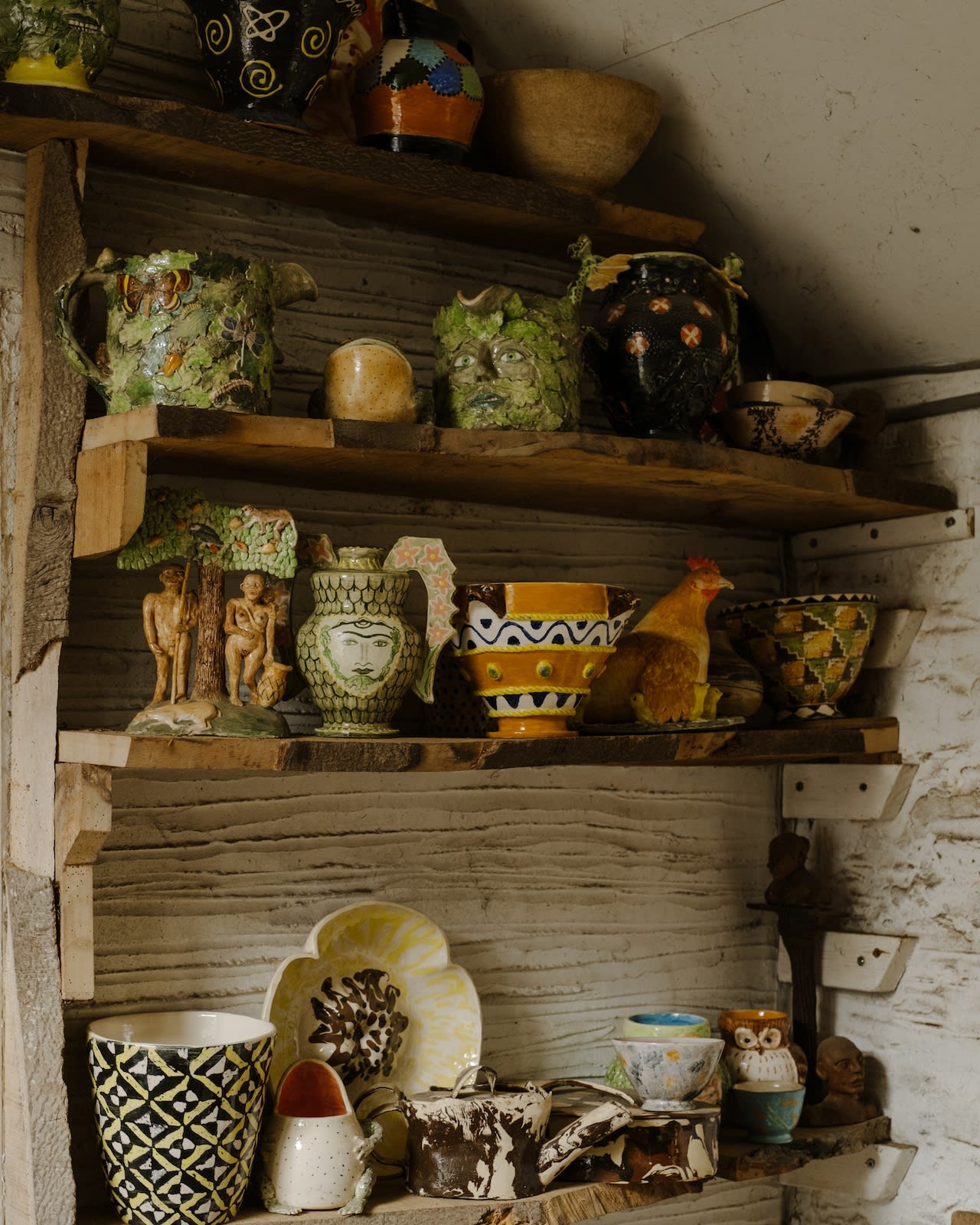 Prue's ceramics sitting comfortably on Beech shelves made from a felled tree on the estate of Marston House.