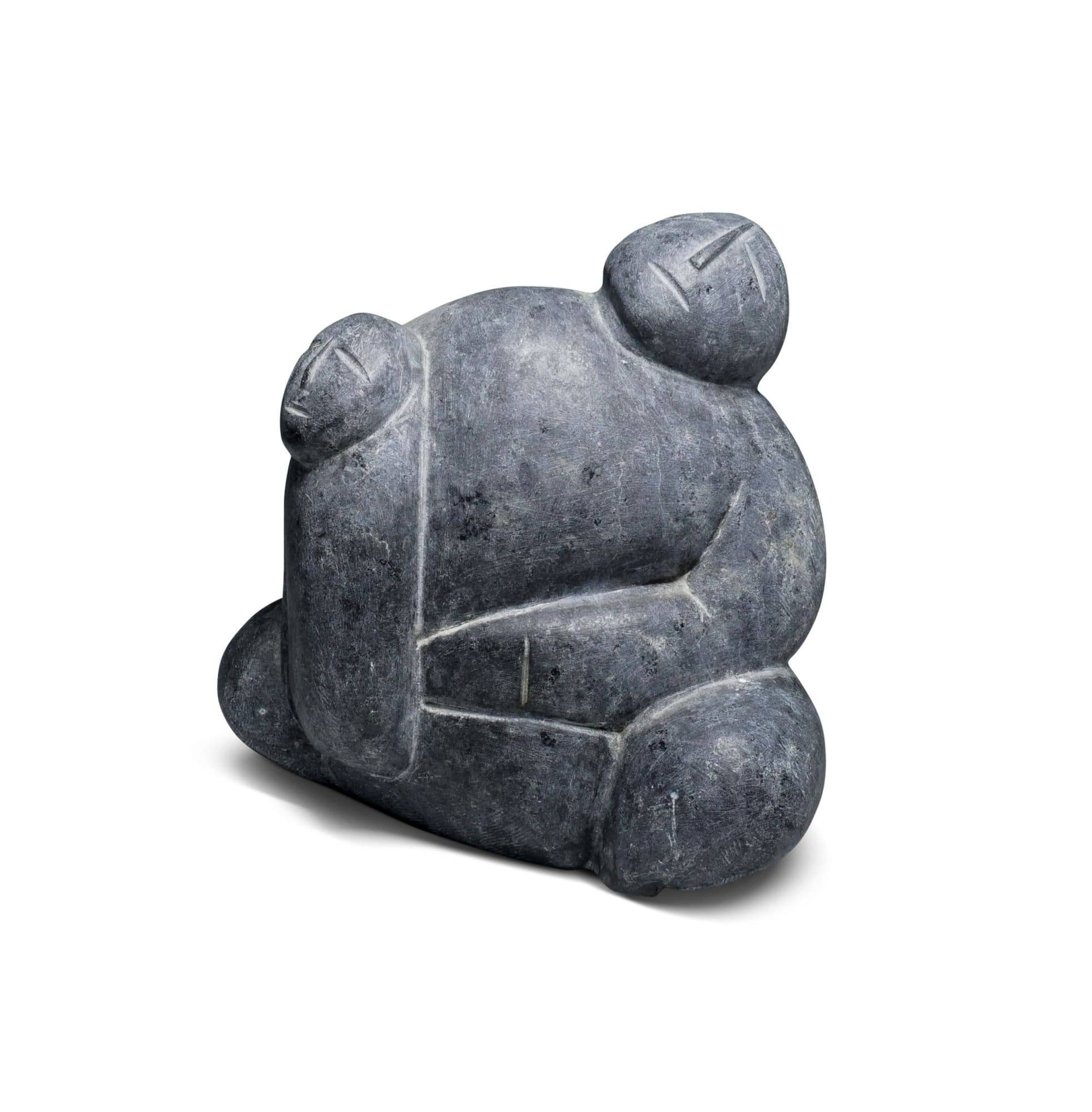 LOT 56 SUZANNE UKUTAK KRINIKSI (1941-D) ARVIAT (ESKIMO POINT) Mother Holding Child, early 1990s stone, 4 1/2 x 5 x 2 3/4 in (11.4 x 12.7 x 7 cm) ESTIMATE: $400 — $600 Price realized: $570