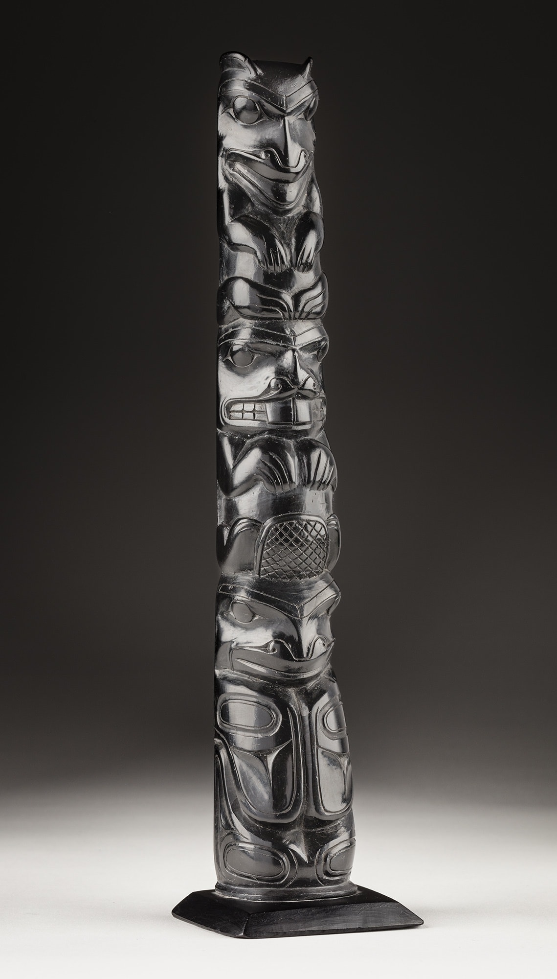 Lot 55 UNIDENTIFIED ARTIST, HAIDA, PROBABLY MASSET, HAIDA GWAII Totem Pole, c. 1900-1910 argillite, 9.5 x 2.5 x 2 in (24.1 x 6.3 x 5.1 cm) Estimate: $1,800⁠ — $2,800 Price realized: $4,560