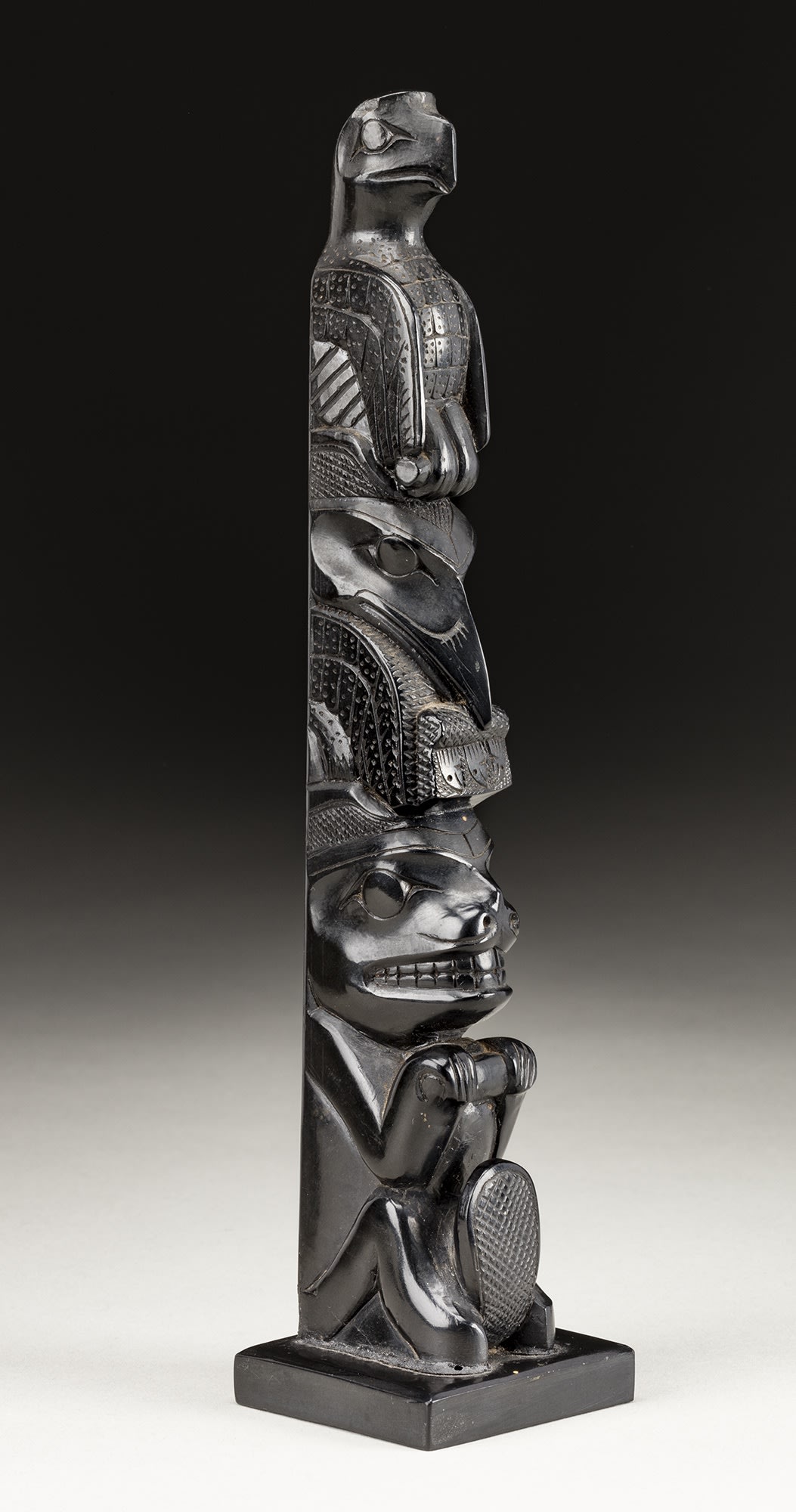 Lot 56 POSSIBLY PAUL JONES (c. 1847-1927), SKIDEGATE, HAIDA GWAII Totem Pole, c. 1890-1910 argillite, 9.5 x 2 x 2 in (24.1 x 5.1 x 5.1 cm) Estimate: $1,500 — $2,500 Price realized: $3,840