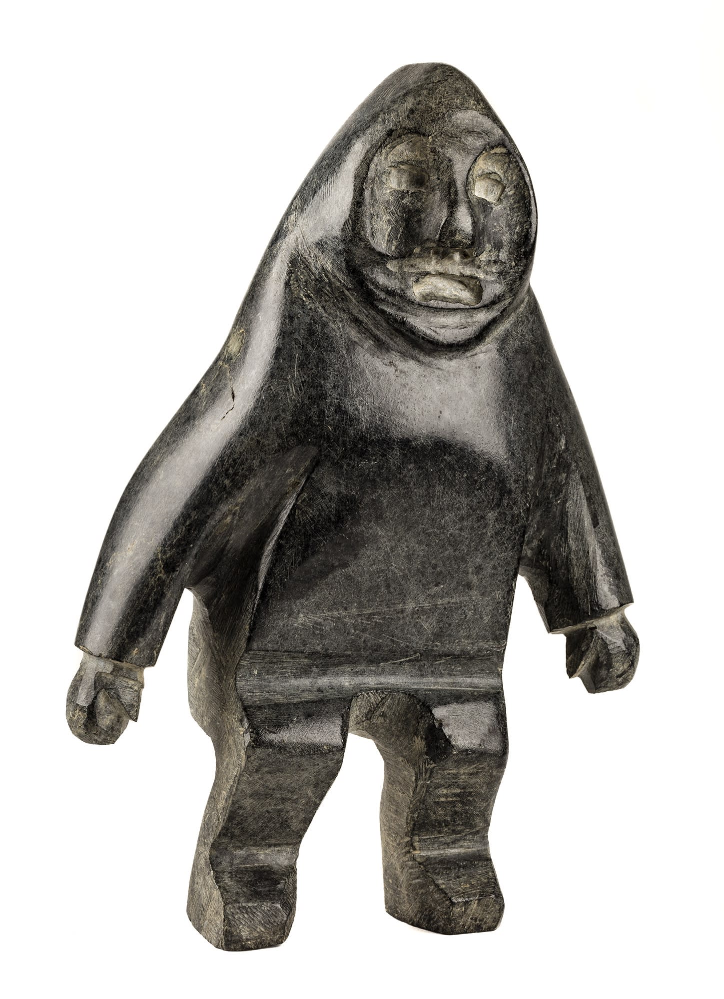 Lot 11 JOHN KAVIK (1897-1993) KANGIQLINIQ (RANKIN INLET) Standing Man, mid-late 1960s stone, 9.75 x 6.75 x 3.25 in (25 x 17 x 8.5 cm) Estimate: $5,000 — $7,000 Price realized: $4,800