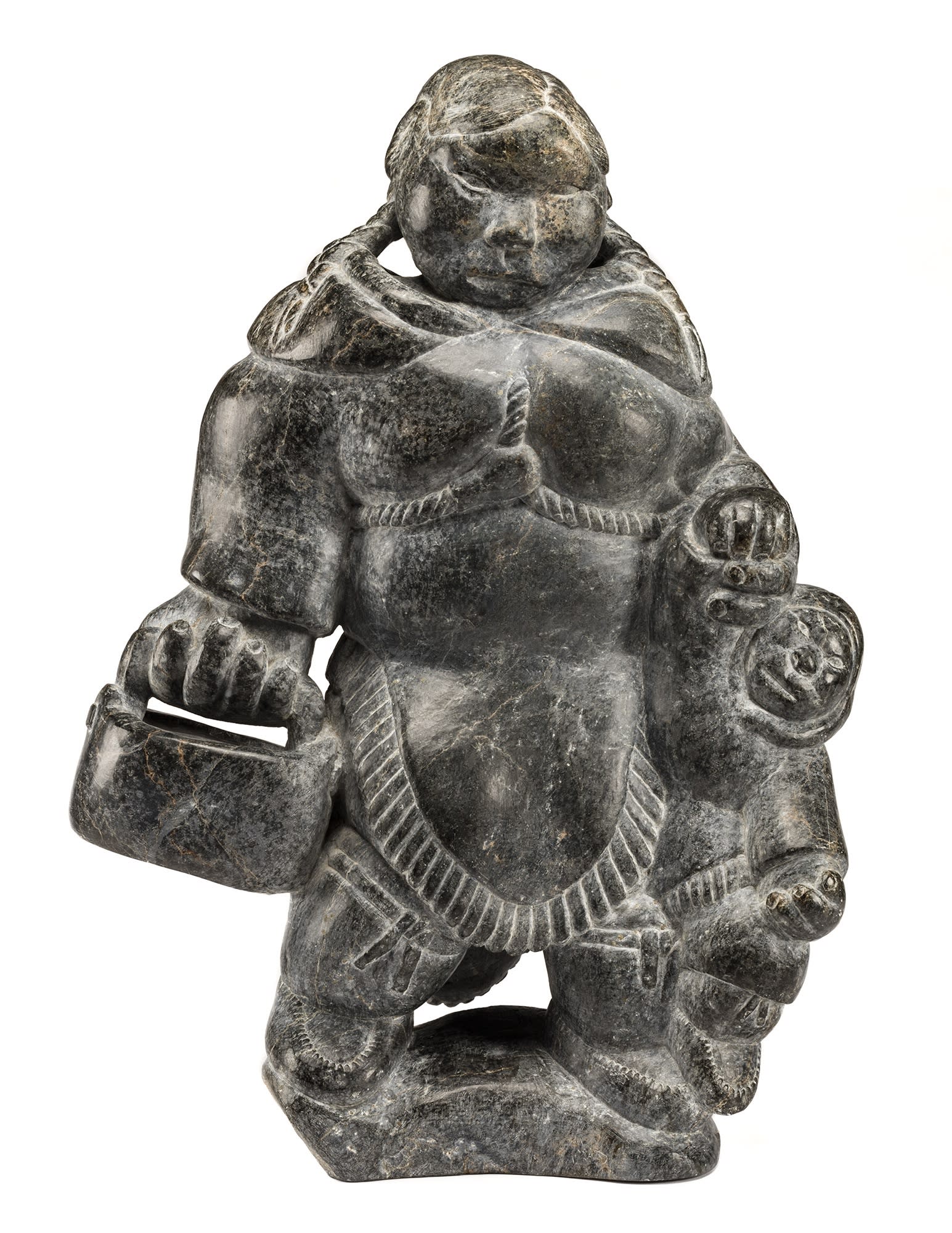 Lot 24 JOHNNY INUKPUK, R.C.A. (1911-2007), INUKJUAK (PORT HARRISON) Mother and Child, Carrying a Pail, early 1960s stone, 25.25 x 18.5 x 8.5 in (64.1 x 47 x 21.6 cm) Estimate: $30,000 — $45,000 PRICE REALIZED: $78,000