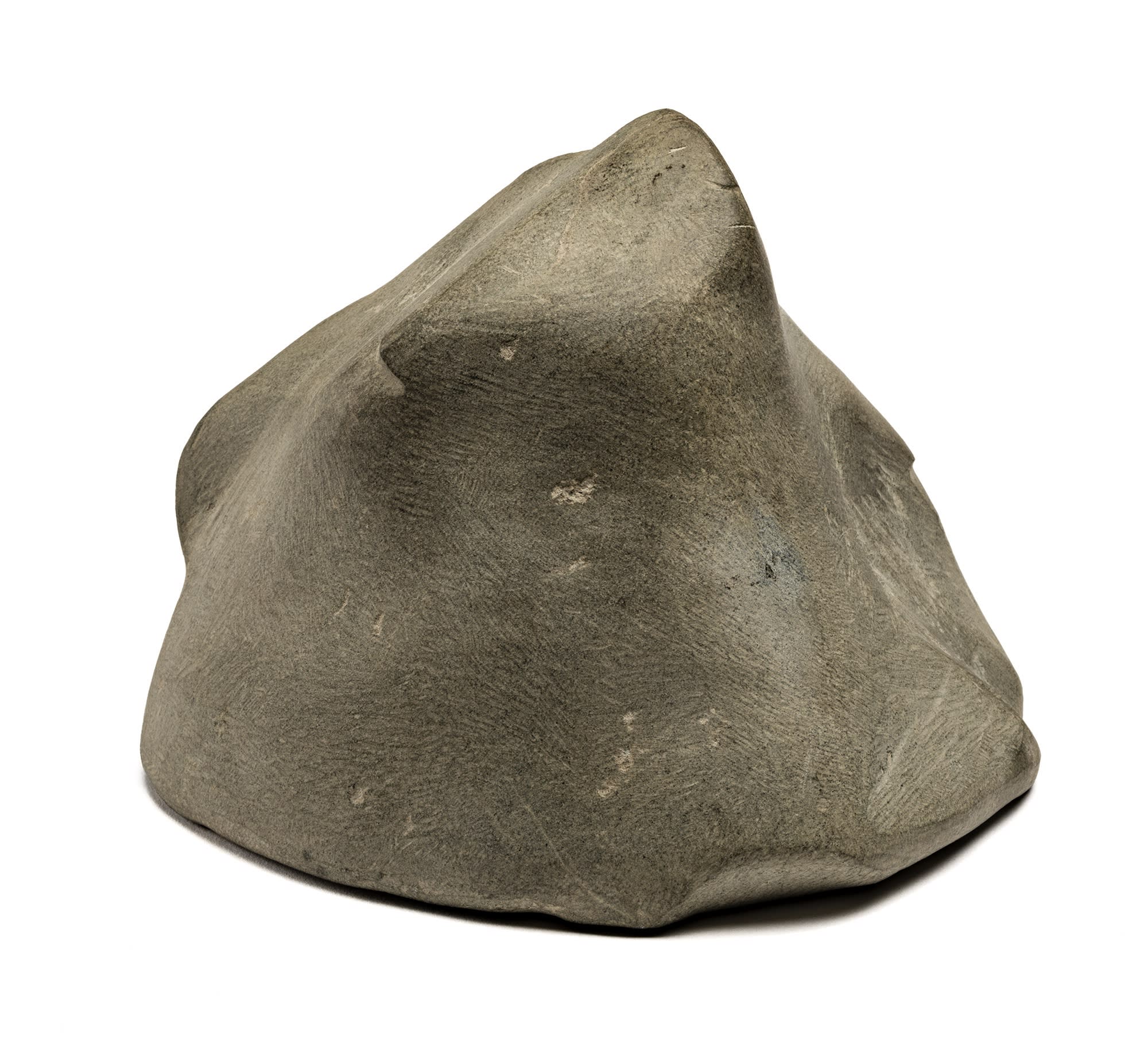 Lot 30 JOHN PANGNARK (1920-1980) ARVIAT (ESKIMO POINT) Figure, c. 1973-75 stone, 4.5 x 6.25 x 4.25 in (11.4 x 15.9 x 10.8 cm) Estimate: $3,000 — $5,000 Price realized: $3,120