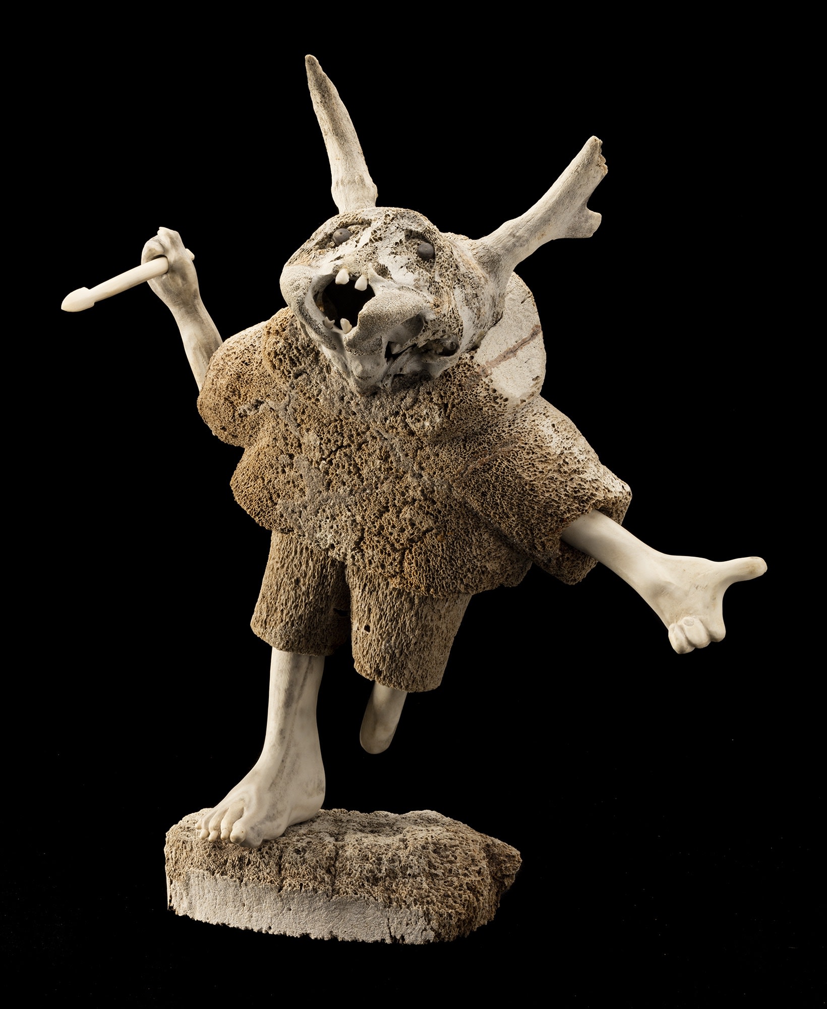 Lot 36 NICK SIKKUARK (1943-2013) KUGAARUK (PELLY BAY) / UQSUQTUUQ (GJOA HAVEN) Shaman, c. 1987 whale bone, caribou skull, caribou antler, and teeth, 16 x 12 x 6 in (40.6 x 30.5 x 15.2 cm) Estimate: $7,000 — $10,000 Price realized: $24,000