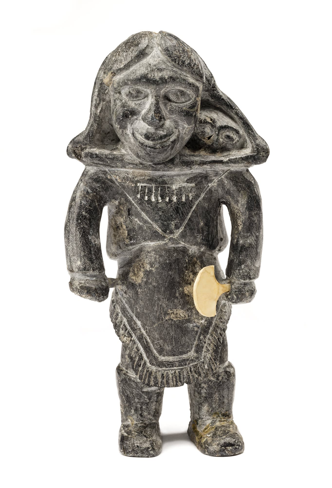 Lot 47 JOE TALIRUNILI (1893-1976) PUVIRNITUQ (POVUNGNITUK) Mother With Child in Her Amautiq, c. 1965 stone and ivory, 5.5 x 3 x 2 in (14 x 7.6 x 5.1 cm) Estimate: $2,500⁠ — $3,500 price realized: $5,040