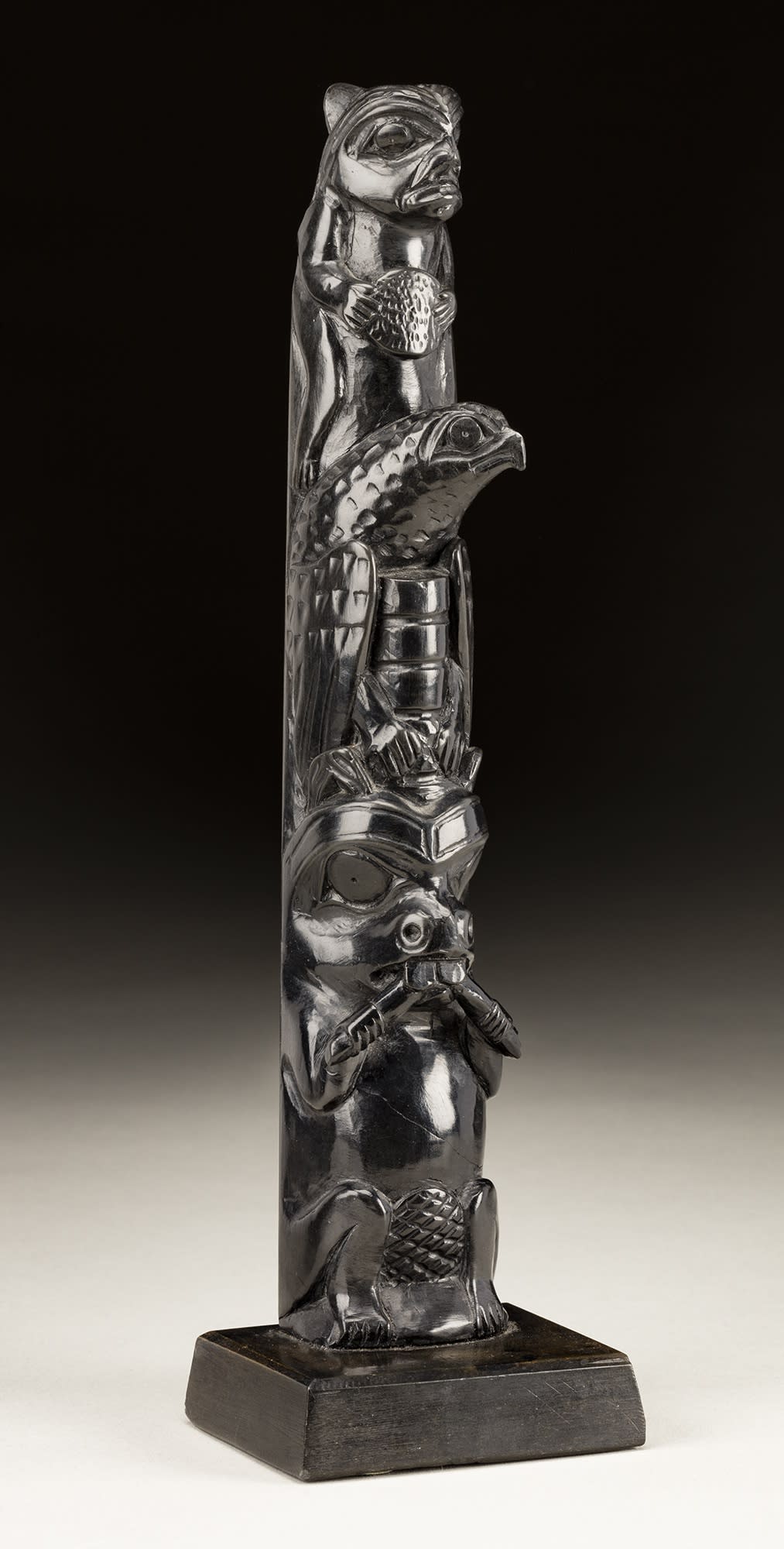 Lot 52 CAPTAIN ANDREW BROWN (1879-1962), HAIDA, MASSET, HAIDA GWAII Totem Pole, c. 1910-30 argillite, 10.5 x 2.75 x 2.25 in (26.7 x 7 x 5.7 cm) Estimate: $2,500 — $3,500 Price realized: $4,320