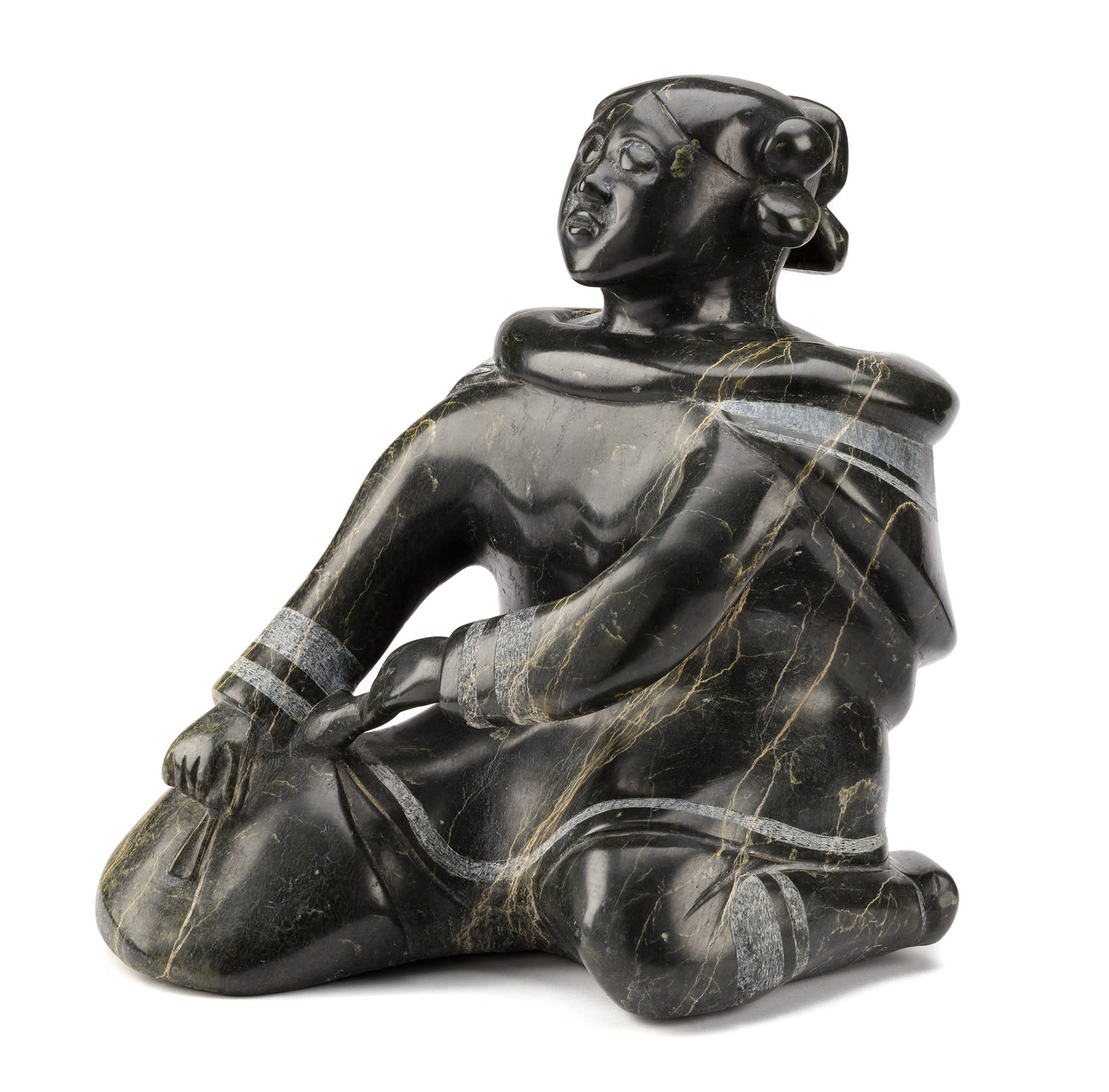 Lot 80 OSUITOK IPEELEE, R.C.A. (1923-2005) m., KINNGAIT (CAPE DORSET) Kneeling Woman Scraping a Skin, c. 1970 stone, 14.5 x 13 x 14.5 in (36.8 x 33 x 36.8 cm) Estimate: $25,000— $35,000 Price realiZed: $72,000