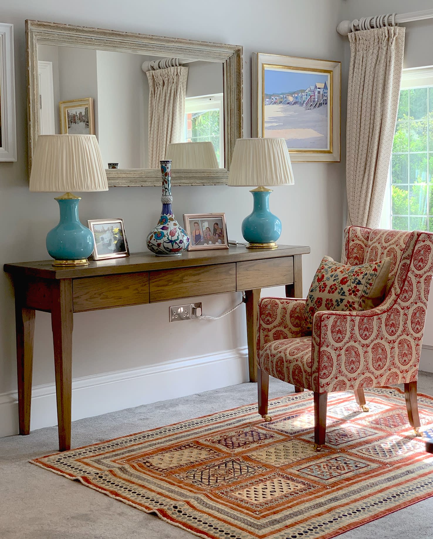 An original painting by John Spakes ROI in this interior with Susan Deliss fabrics and stunning Christopher Spitzmiller lamps.