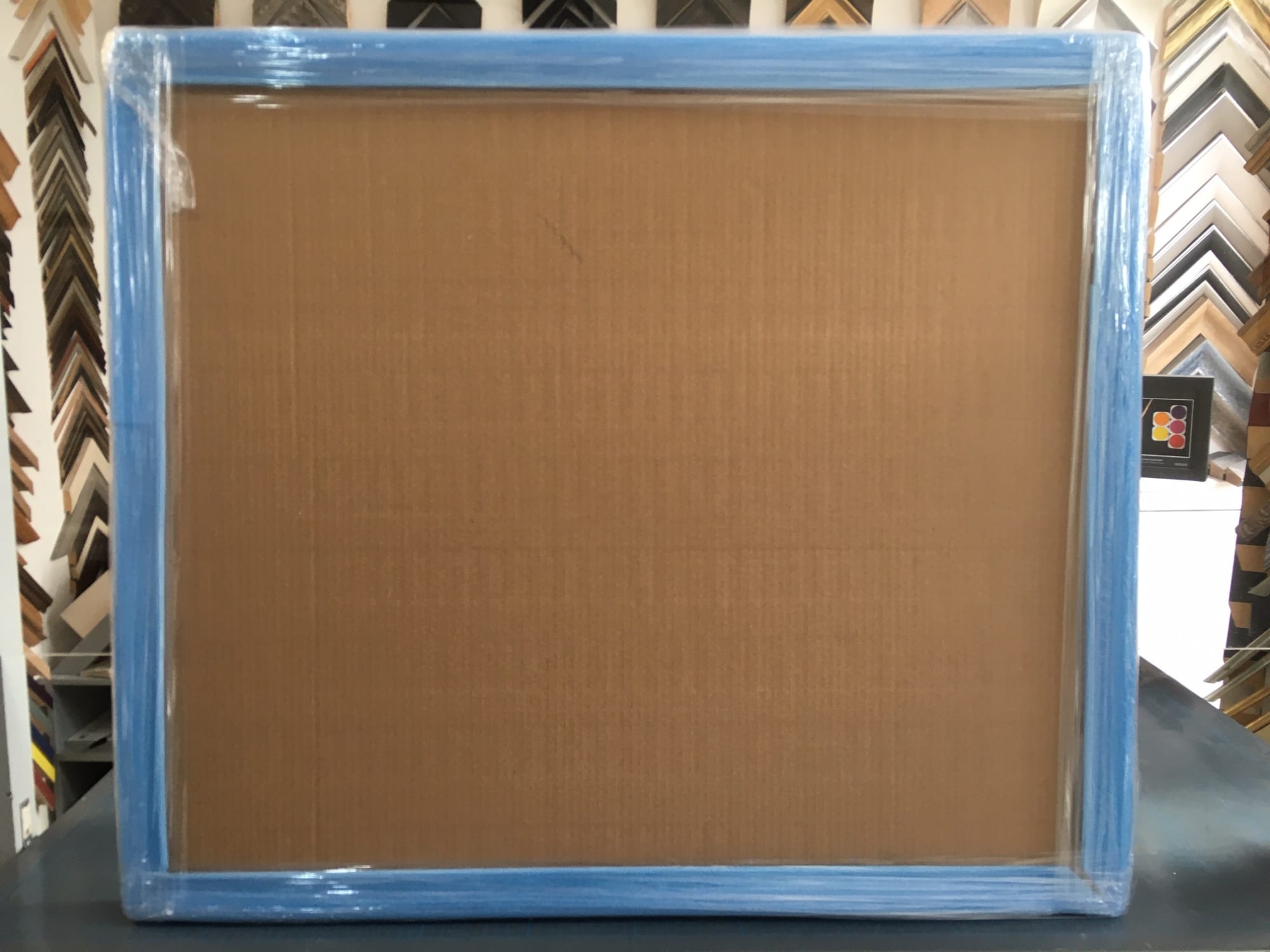 Before dispatch, the framed prints are carefully wrapped and rubber protection added to protect the frame in transit.