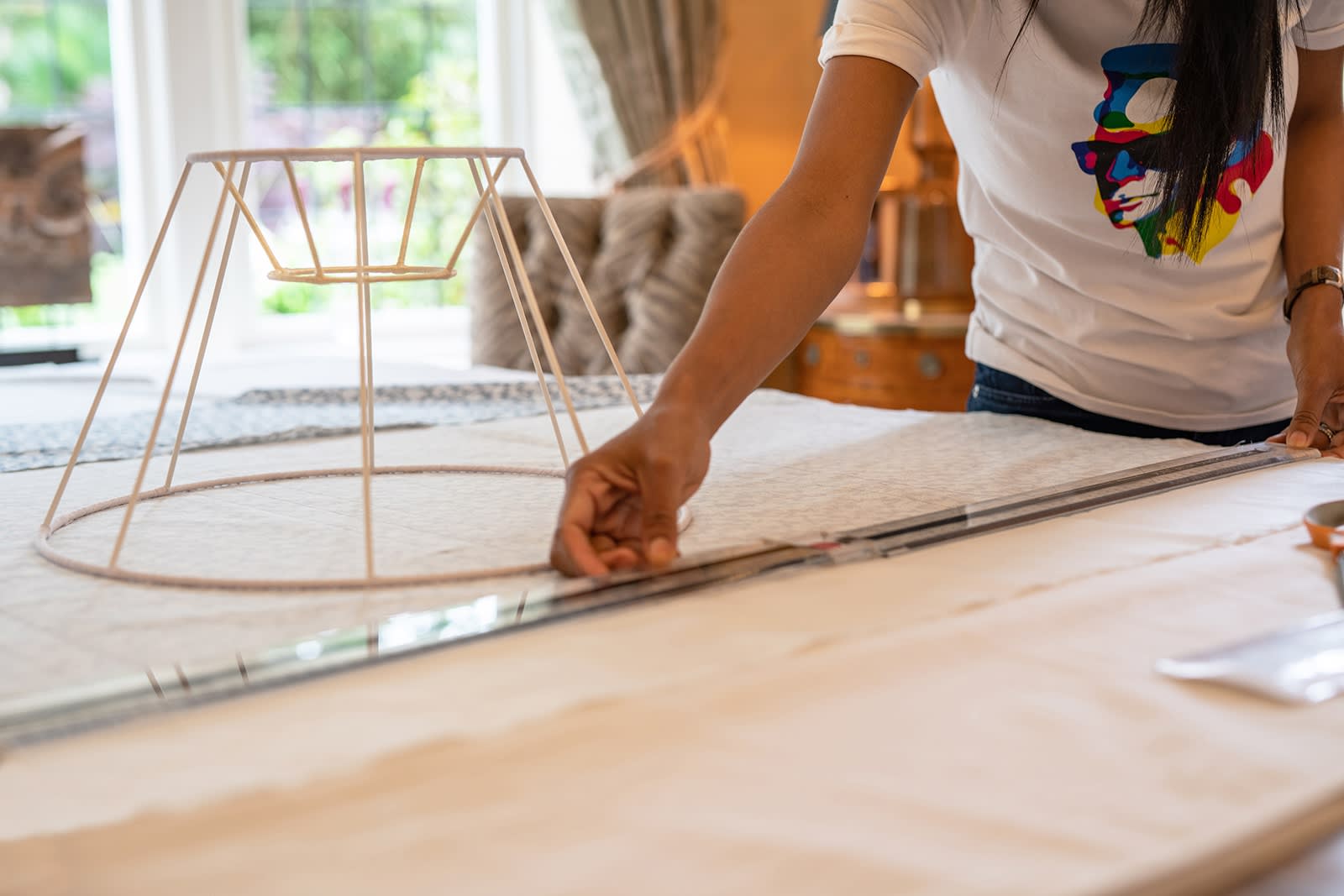 Careful measuring of the fabric and marking on the reverse side with tailor's chalk or pencil.