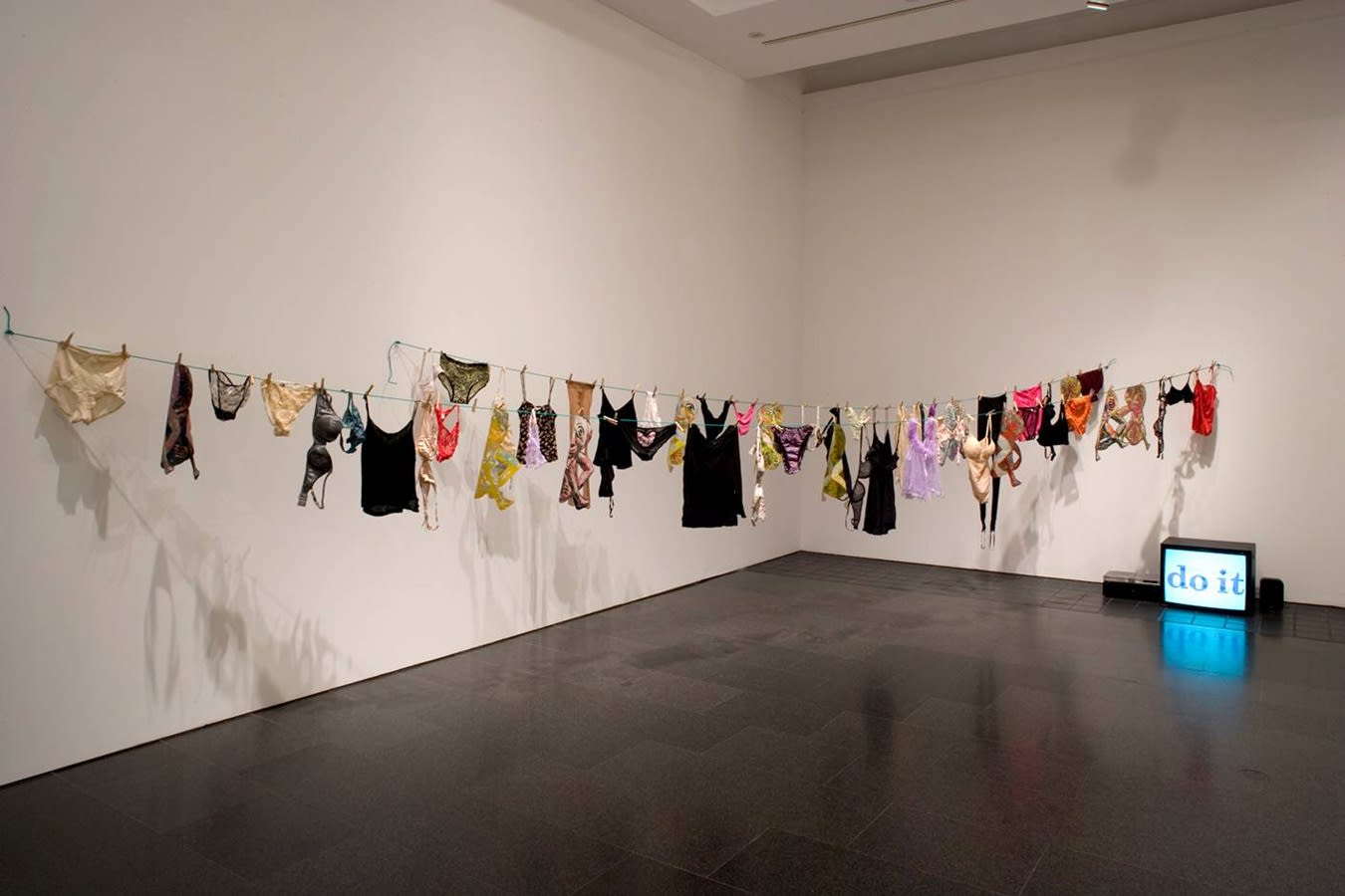 Nancy Spero Sheela-Na-Gig At Home, 1996 Handprinting and printed collage on paper, installation with video, underwear and clothesline Variable dimensions Installation view: Museo d&rsquo;Art Contemporani de Barcelona, Spain, 2008