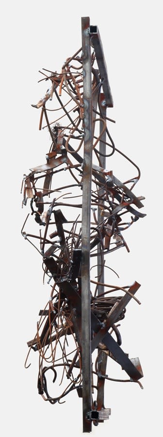 A YOUNG WOMAN READING. 2009. Metal, welding. 100 x 100 x 37 cm.