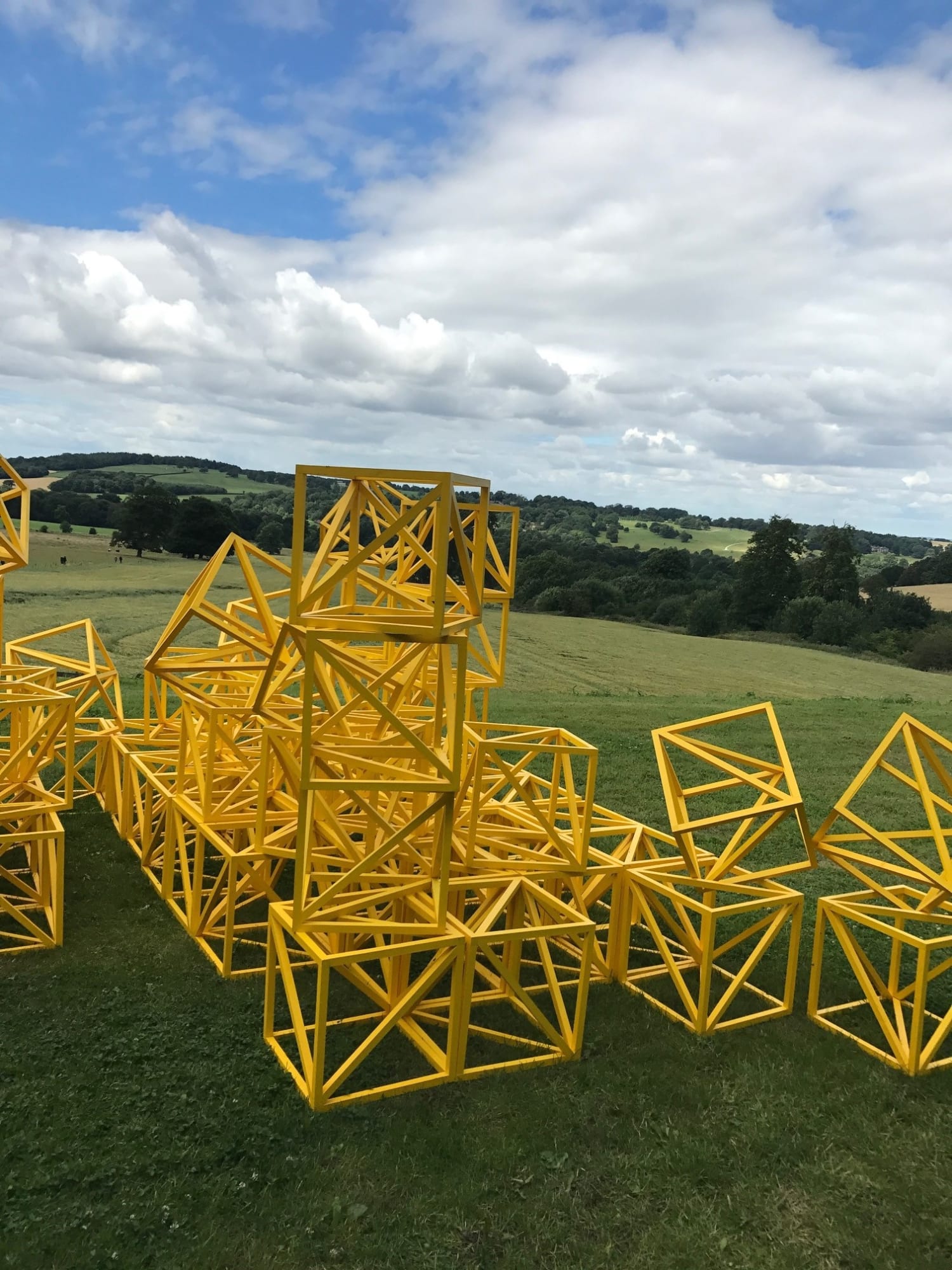 Rasheed Araeen, Zero to Infinity (Sunflower Yellow), outside the Longside Gallery, Yorkshire Sculpture Park