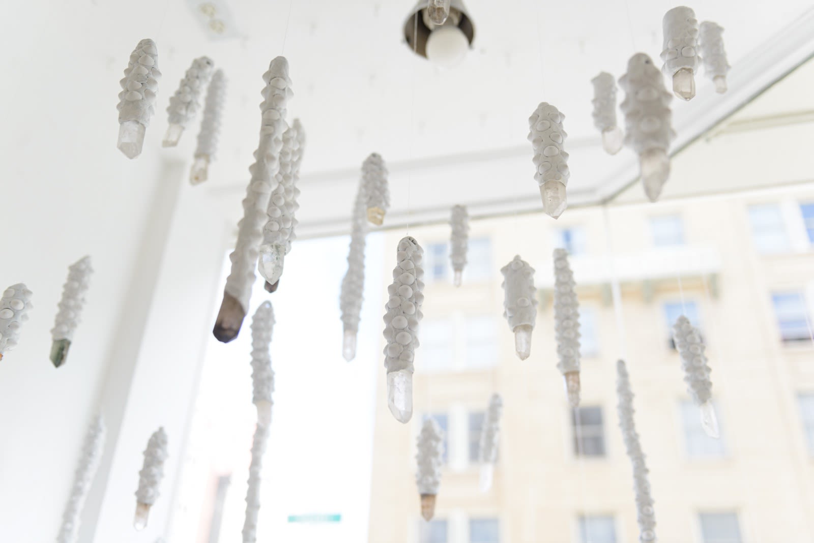 Installation view of Lucien Shapiro's solo show "Oculus", featuring found-object ritual sculptures