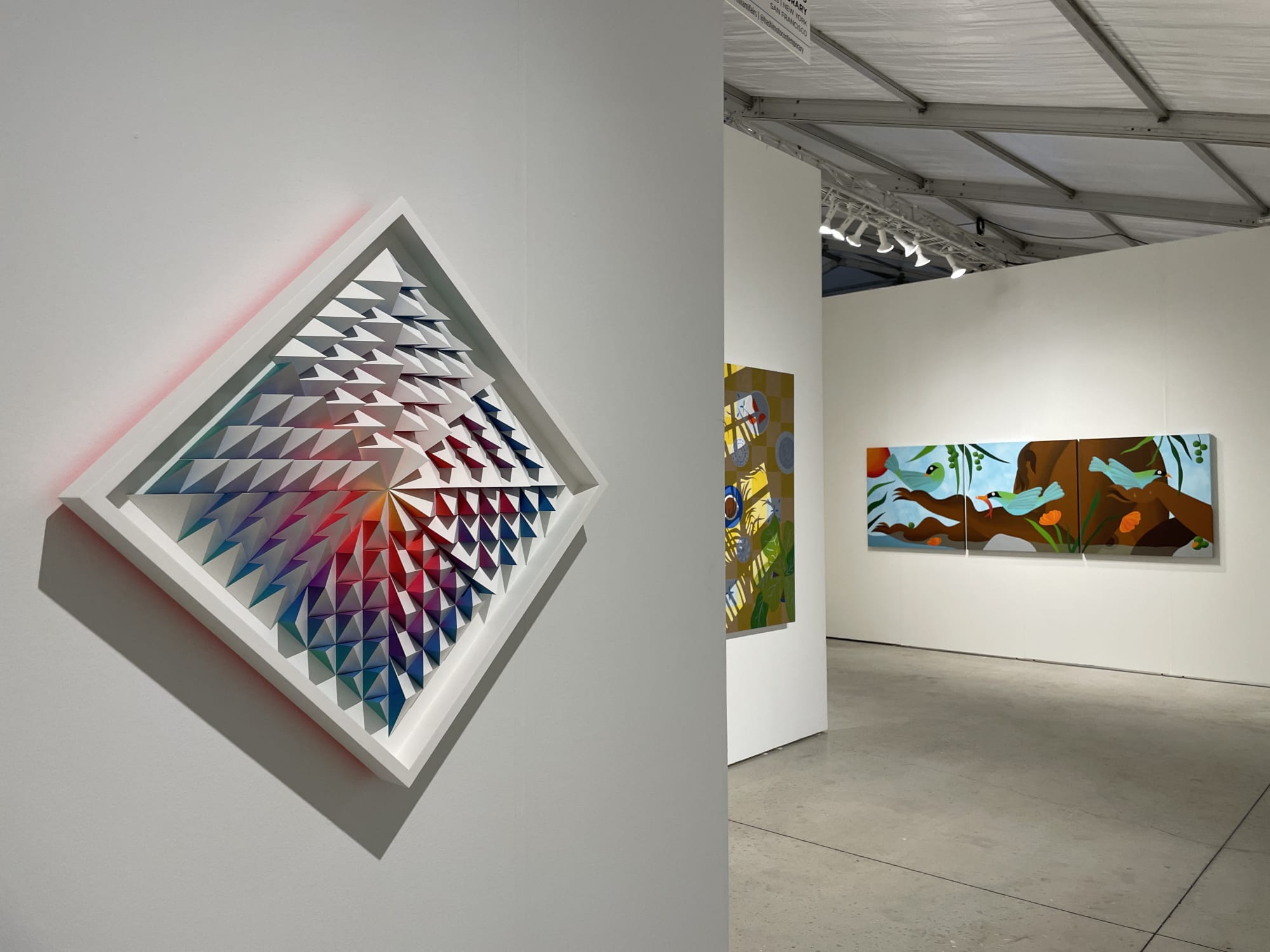 Installation image from Art Miami 2021 of Sean Newports installation and Bianca Nemeic's painting