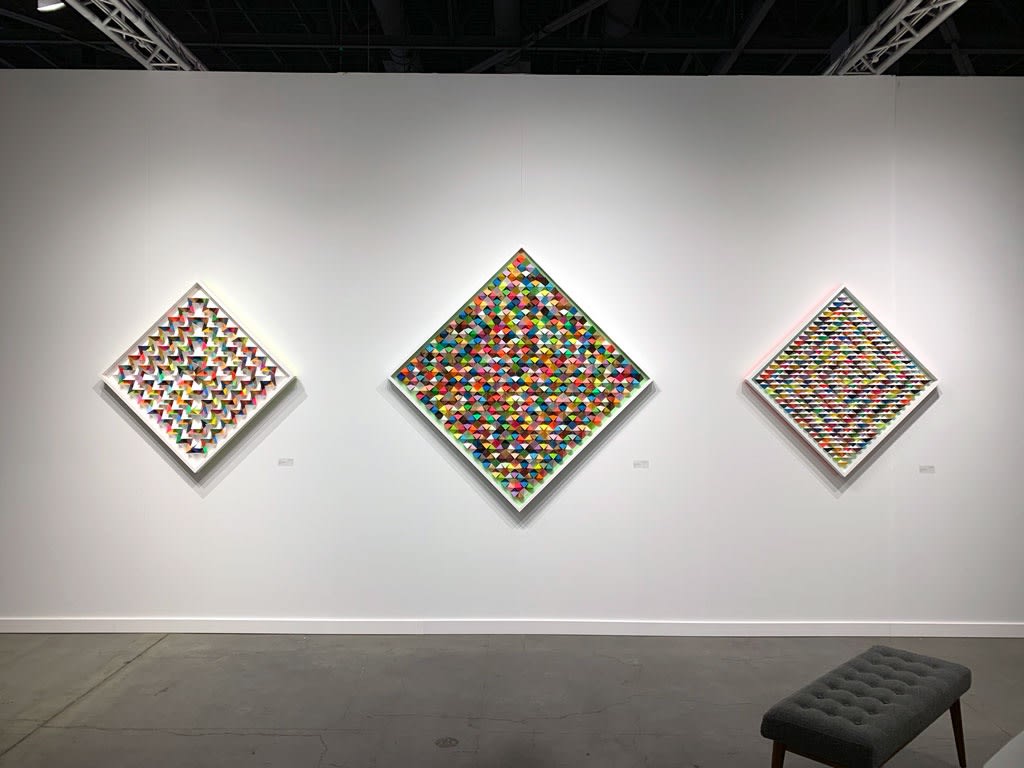Installation view of three various sized artworks by Sean Newport