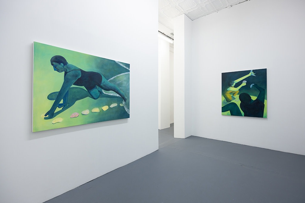 Installation image of blue and green Genevieve Cohn paintings