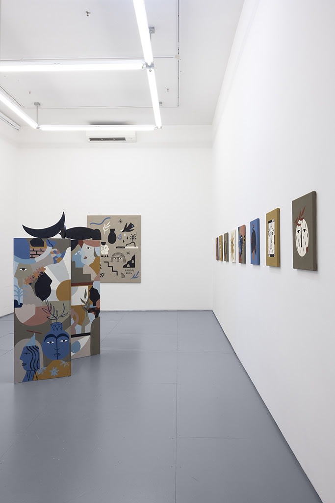 Installation image of collage like artworks from artist Madi
