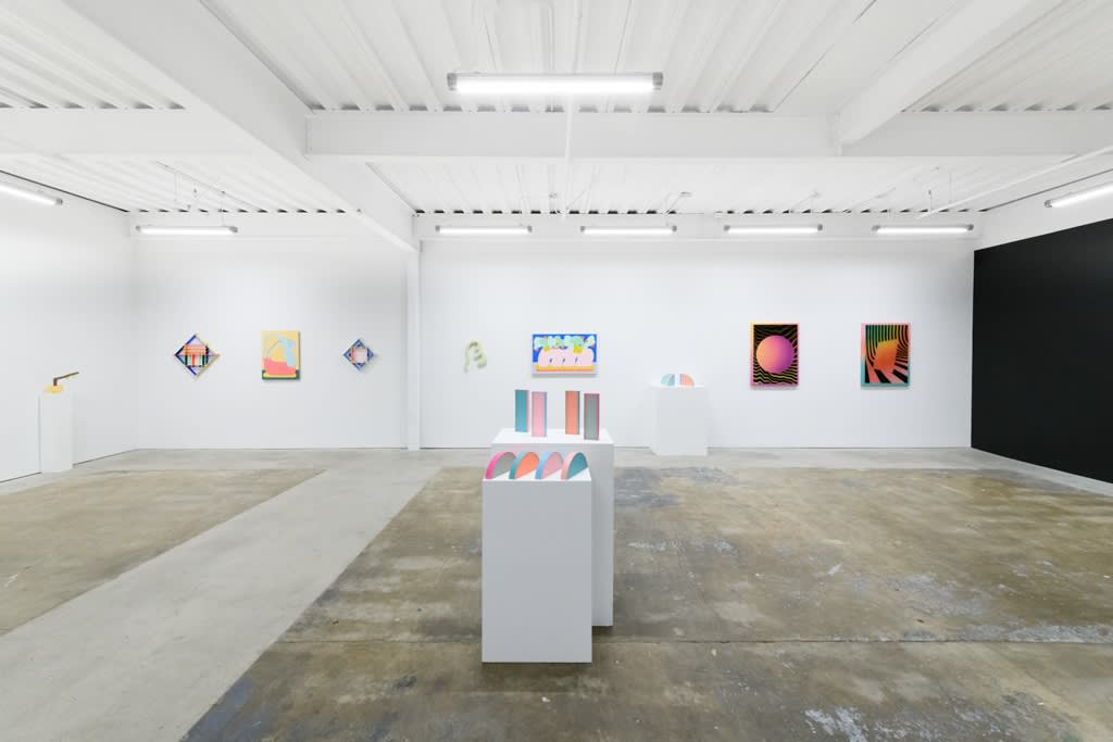 Install image of "Cosmic Bloom." From left to right, "Apple Elbow in Pale Peach & Luminous Yellow," "Sunset Swim," "Pulp Bouquet No. 03," "Triple Diamond," "Wall Frond," "Bouquet Painting No. 45," Rachel Strum's SLICE sculptures, "MOONSAFARI," "LIGHTFIZZ.