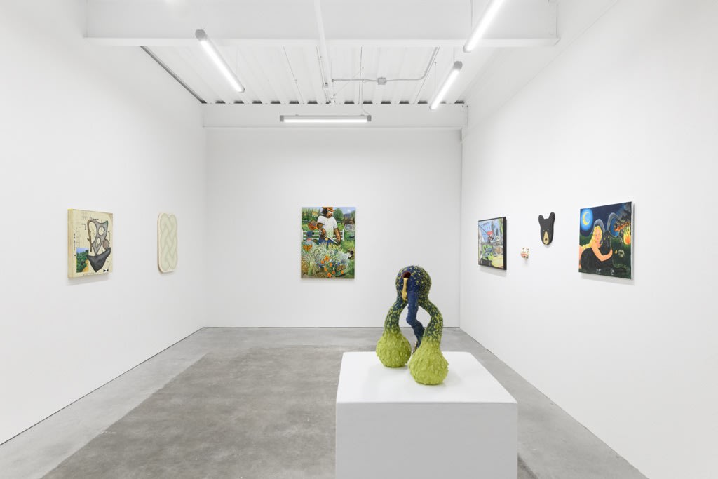 Install Image of "Oddkin", from left to right, “scent trail”, “The Wisdom Knot”, “Weedwacker”, “legs3”, “Birds on the Block”, “Balloons Frog”, “Golden Black Bear”, “Together at Collapse”.