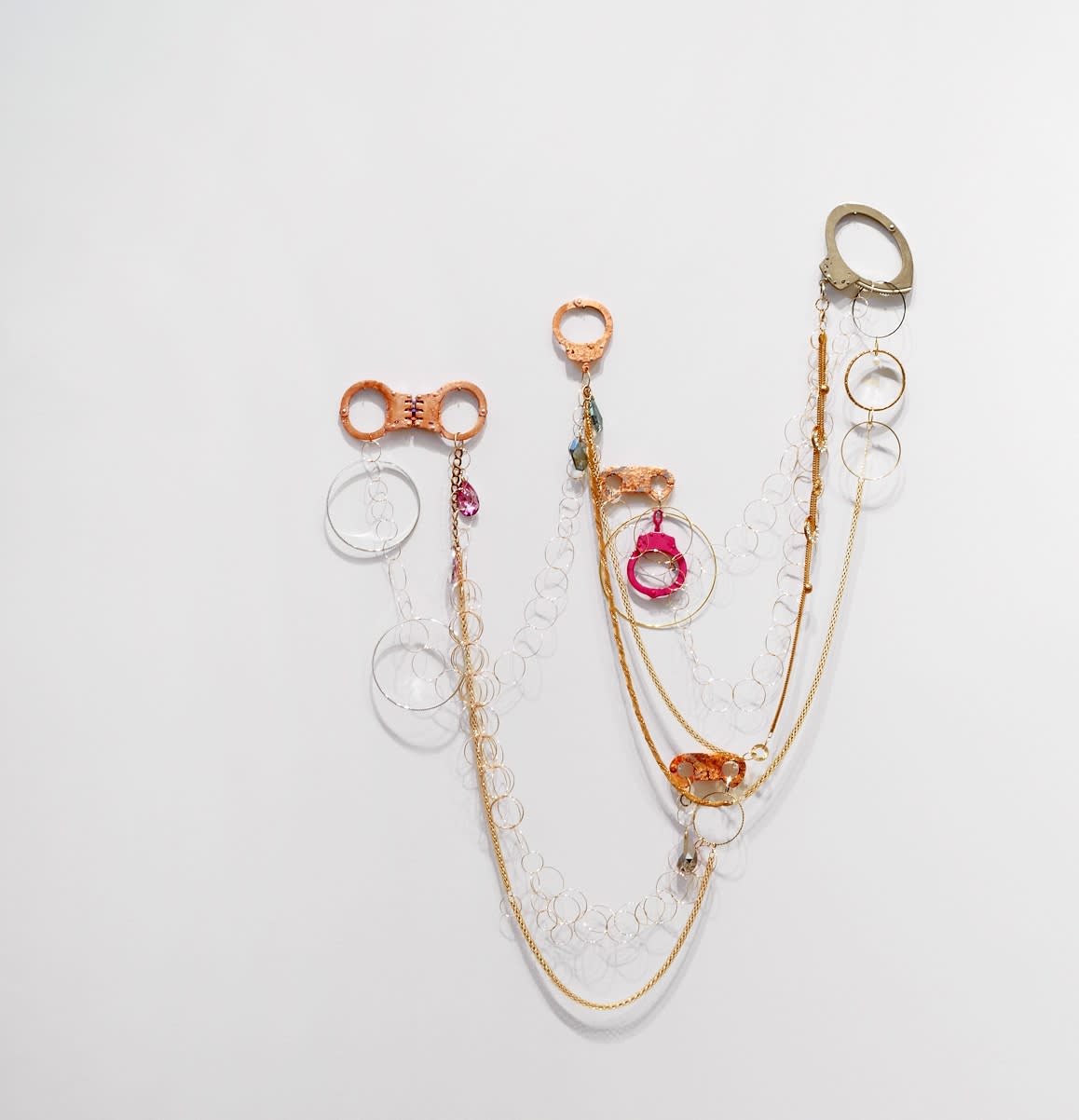 Kambui Olujimi No Belts, No Laces, 2018 mixed media with handcuffs dimensions variable, approximately: 23 x 34 x 2 in.