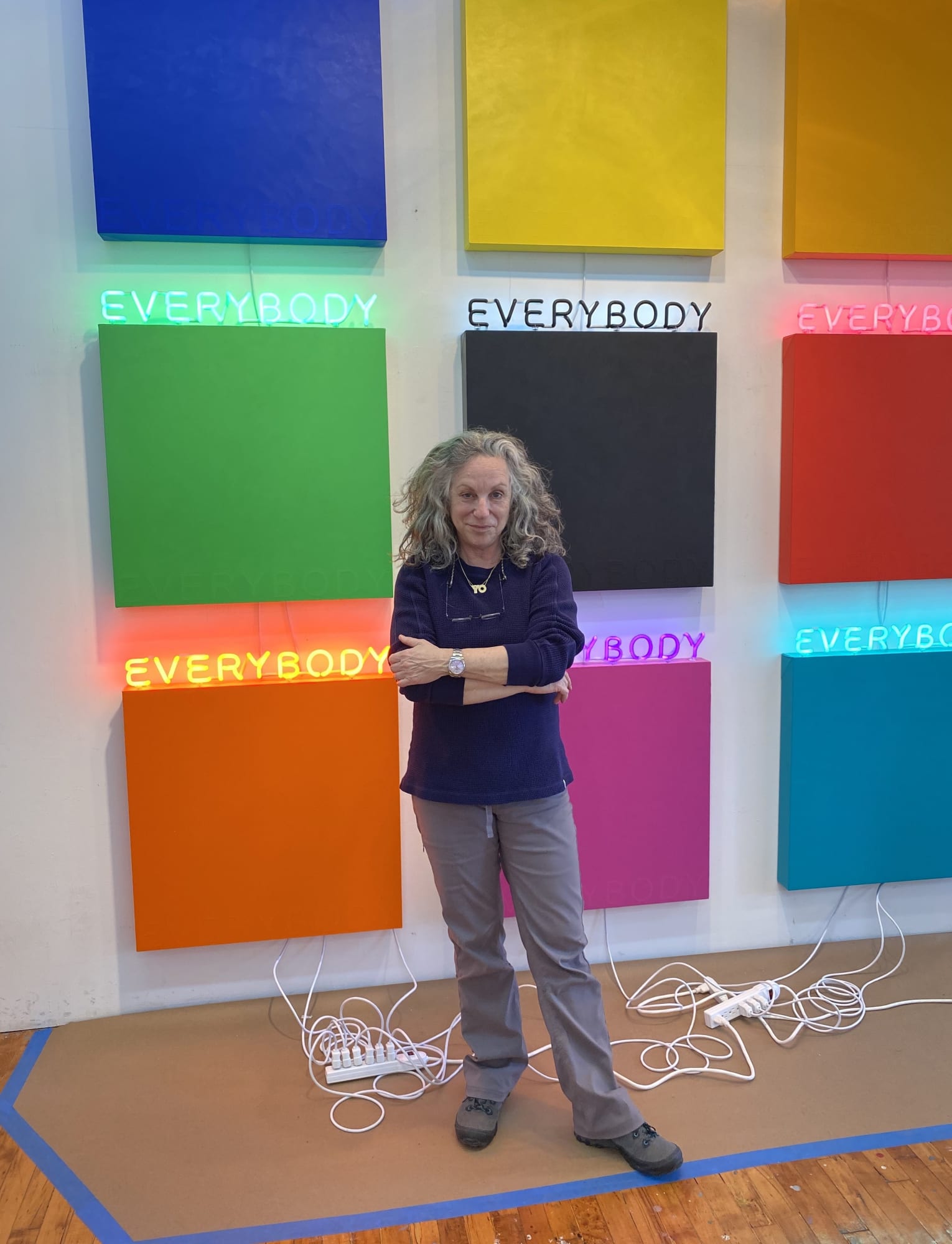 Deborah Kass in her studio in Brooklyn, NY. 2020 (pictured: EVERYBODY, 2019)