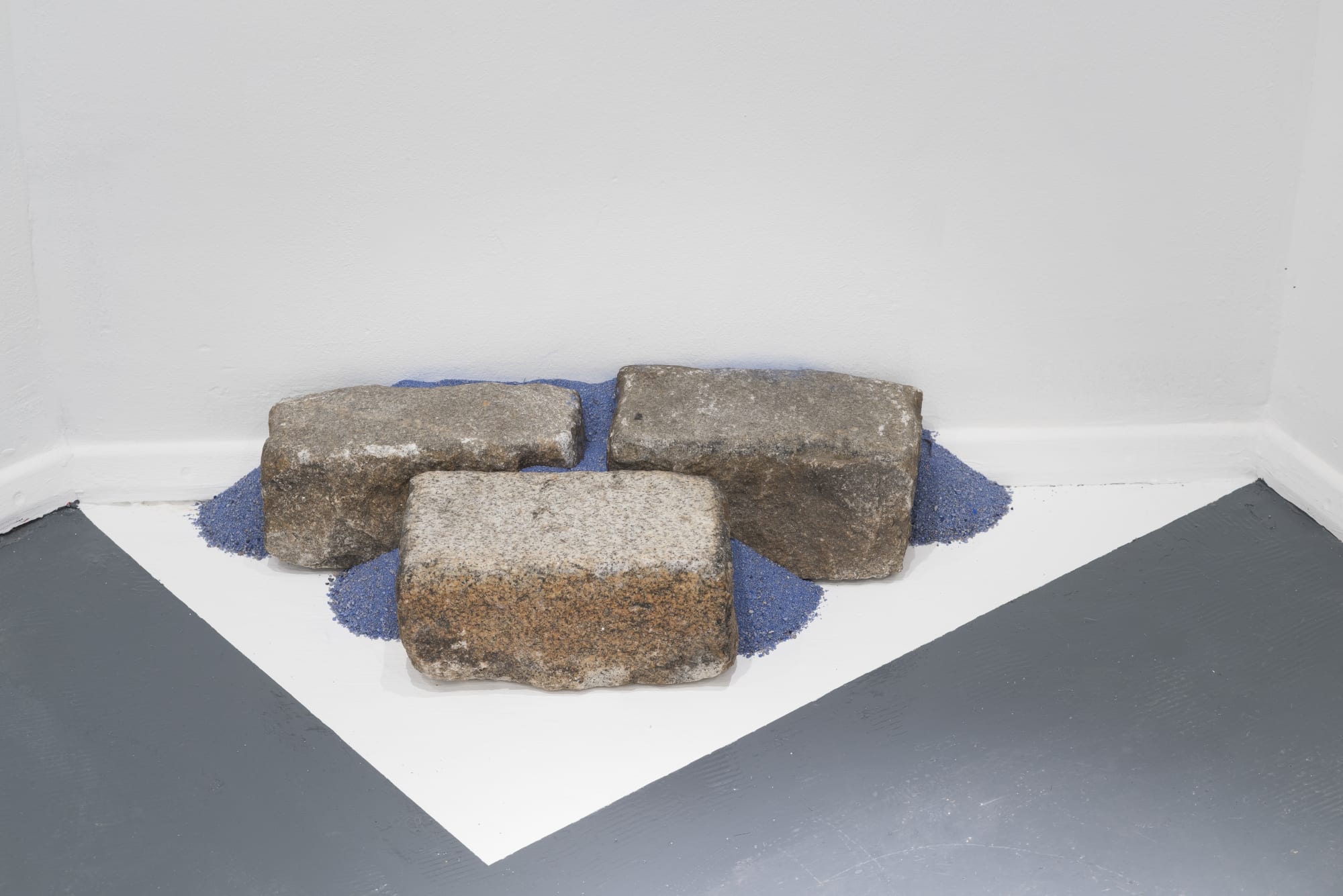 Cobblestones Non-site II, 2016 Sand, Ultramarine pigment, cobblestones 12 x 50 x 32 cm