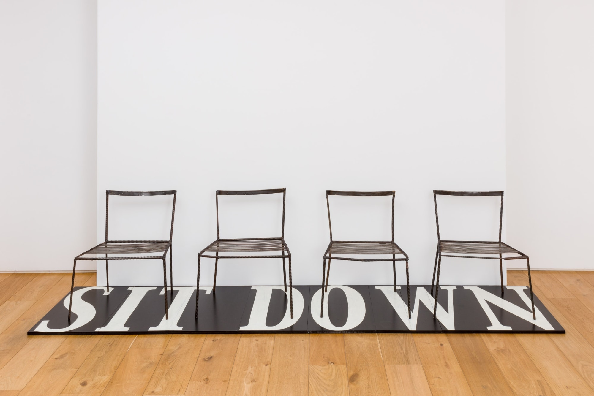 Franz West Untitled (Sit Down), 1996 – 2003 4 metal chairs, wooden board and lacquer (8 parts)