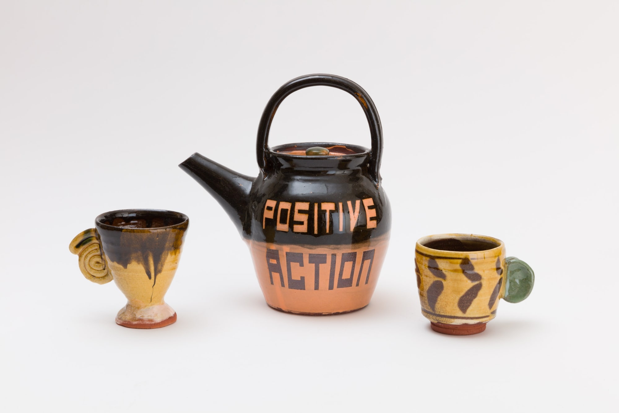 Simon Bayliss Teapot (Positive Action / Radical Hope), 2025 Terracotta, coloured slips, with clear copper glaze