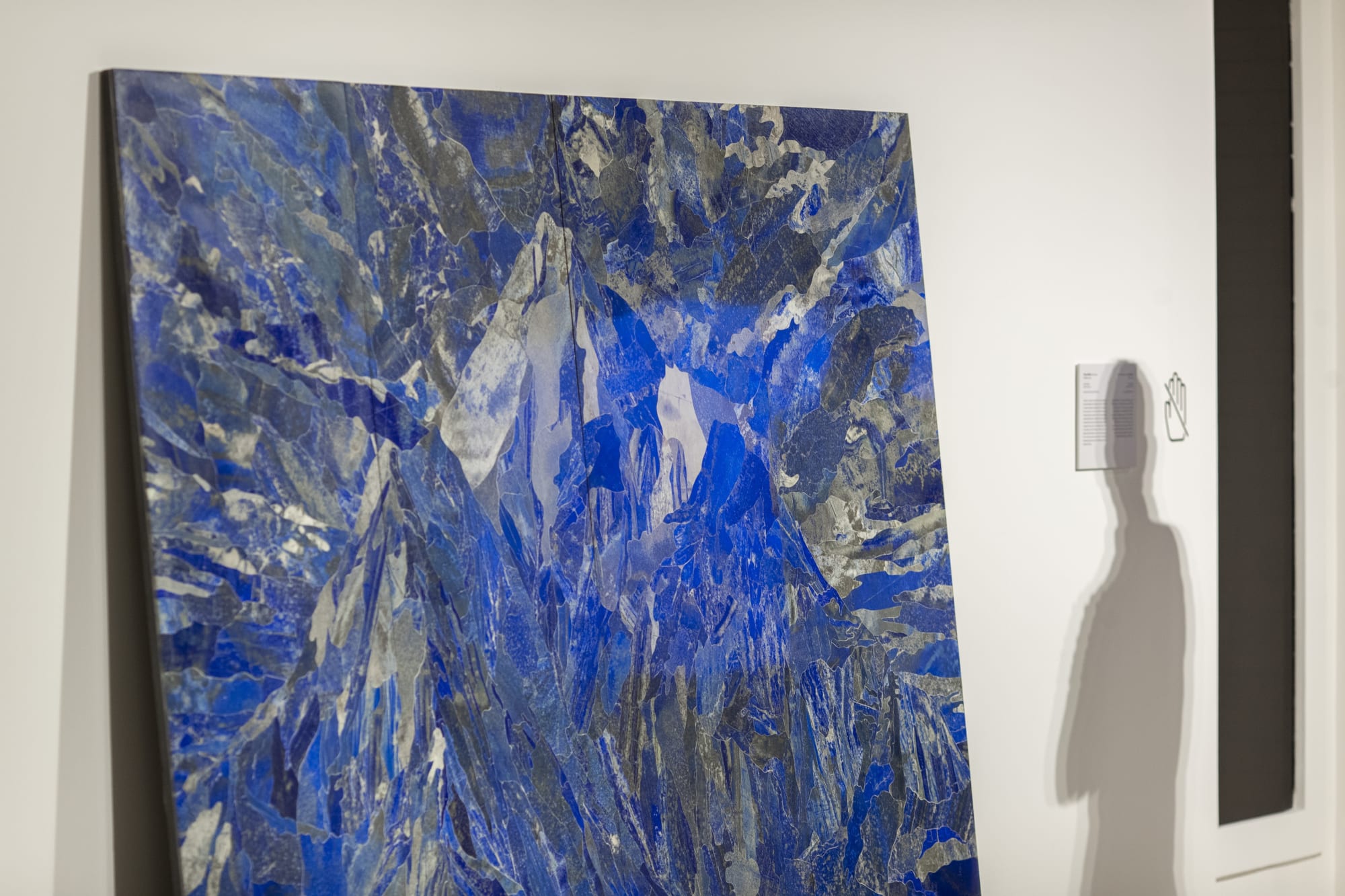 Installation view, Hamra Abbas, Mountain 1, 2022, Lapis lazuli, granite, 182.88 x 243.84 cm, 72 x 96 in. Photo: Misk Art Institute.