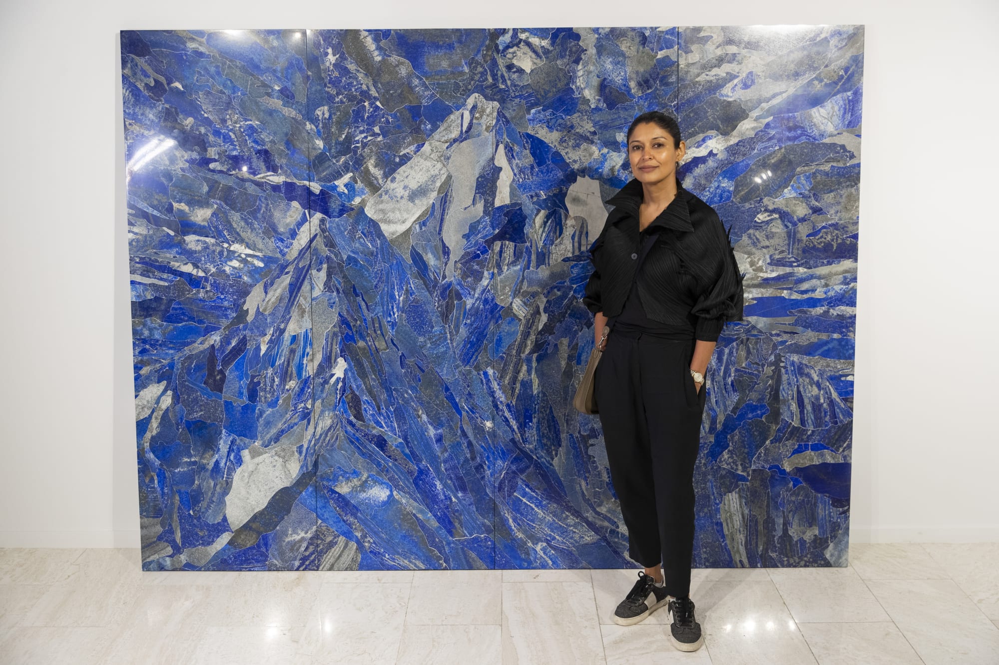Installation view, Hamra Abbas, Mountain 1, 2022, Lapis lazuli, granite, 182.88 x 243.84 cm, 72 x 96 in. Photo: Misk Art Institute.