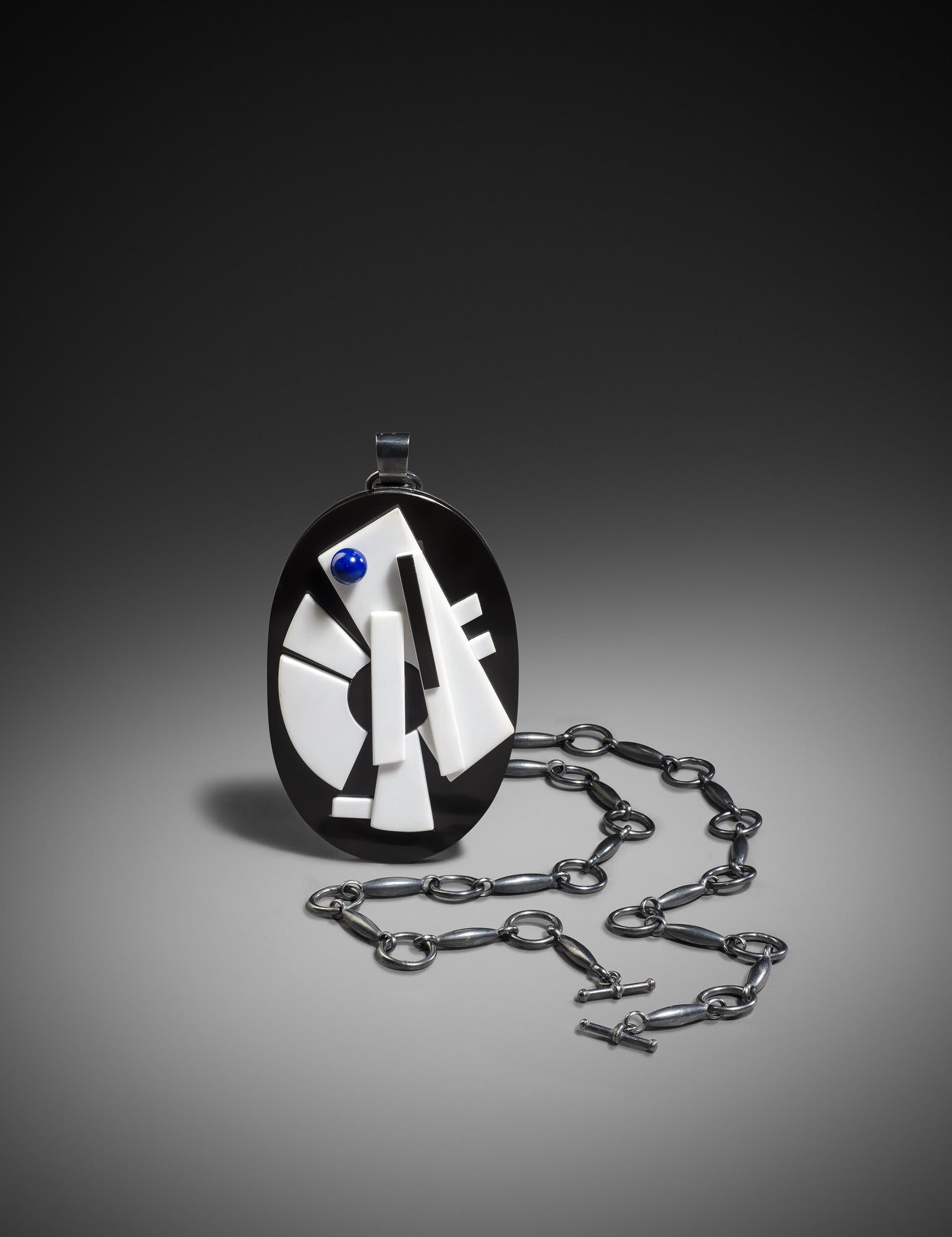 Sophia VariSalmonée Pendant, 2013black Belgian marble, white Carrara marble, lapis lazuli, blackened silverUnique
