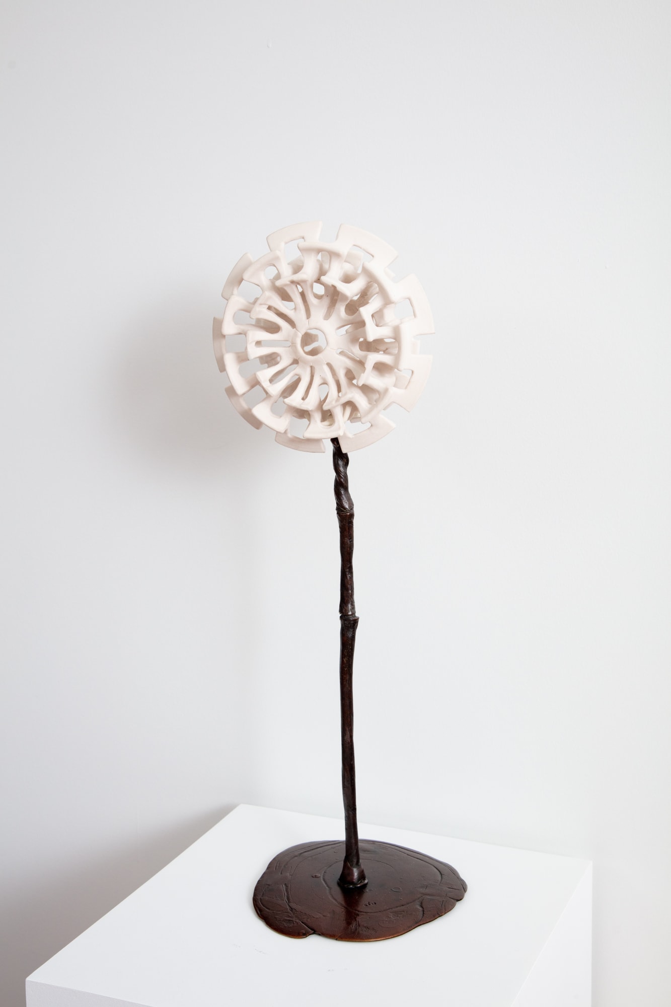 Yassi Mazandi Flower 3, 2023 English porcelain (unique flower), powder coated steel (support), and lost wax bronze (unique stand) 8½ x 8½ x 3 in. 21.59 x 21.59 x 7.62 cm