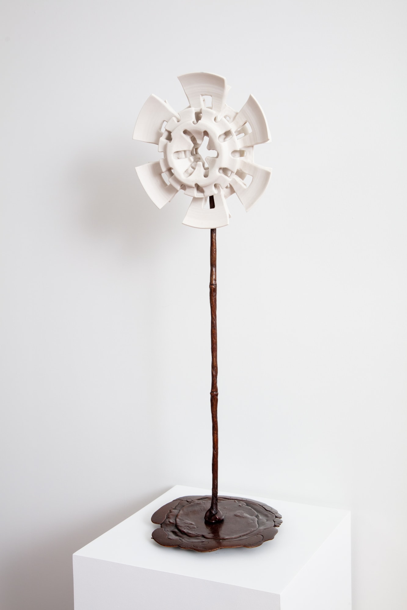 Yassi Mazandi Flower 1, 2023 English porcelain (unique flower), powder coated steel (support), and lost wax bronze (unique stand) 10½ x 10½ in. 26.67 x 26.67 cm