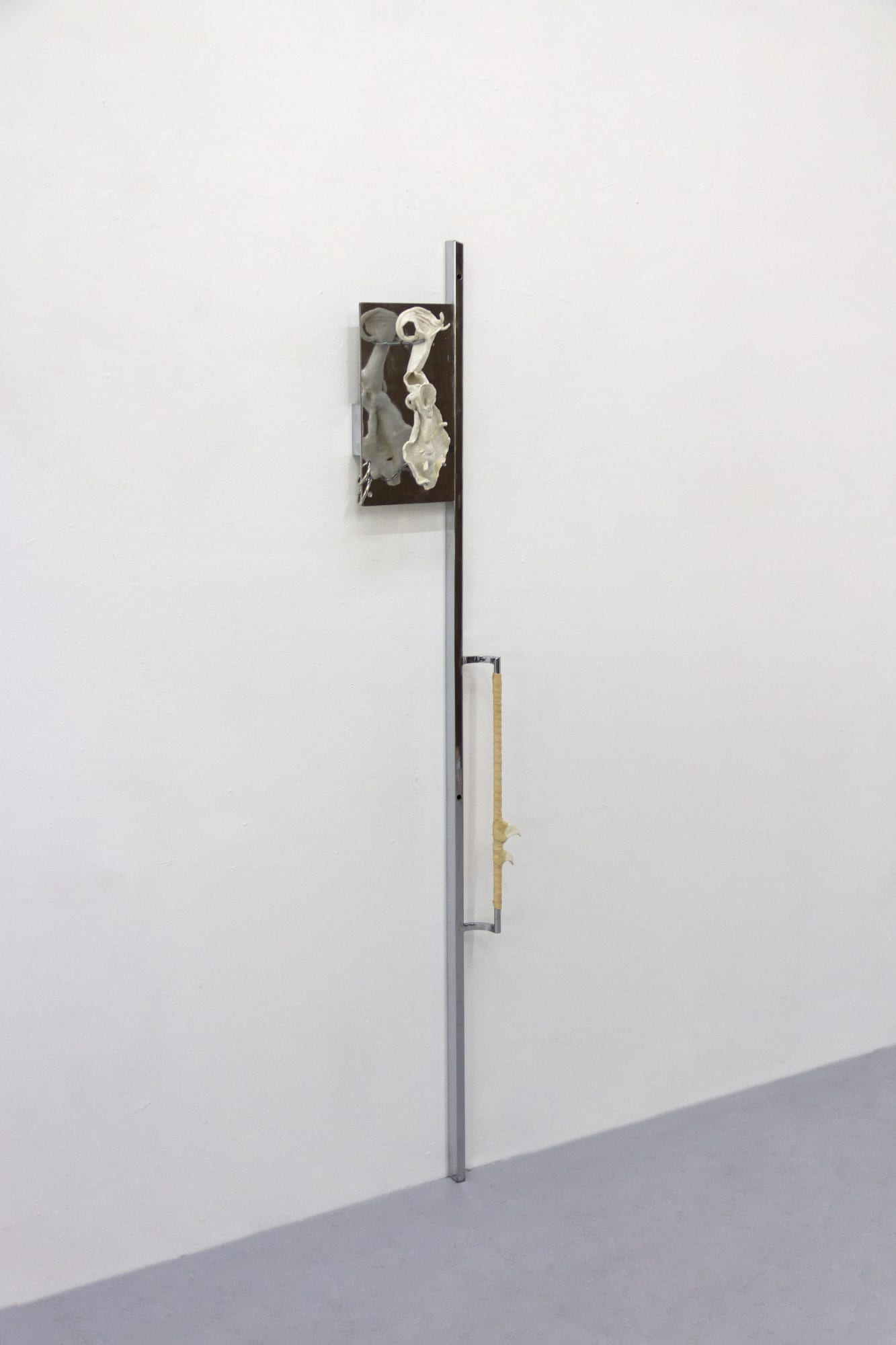 fig 40.4 preta, 2024 chrome-plated steel, porcelain, leather 68 x 12 x 6 in.