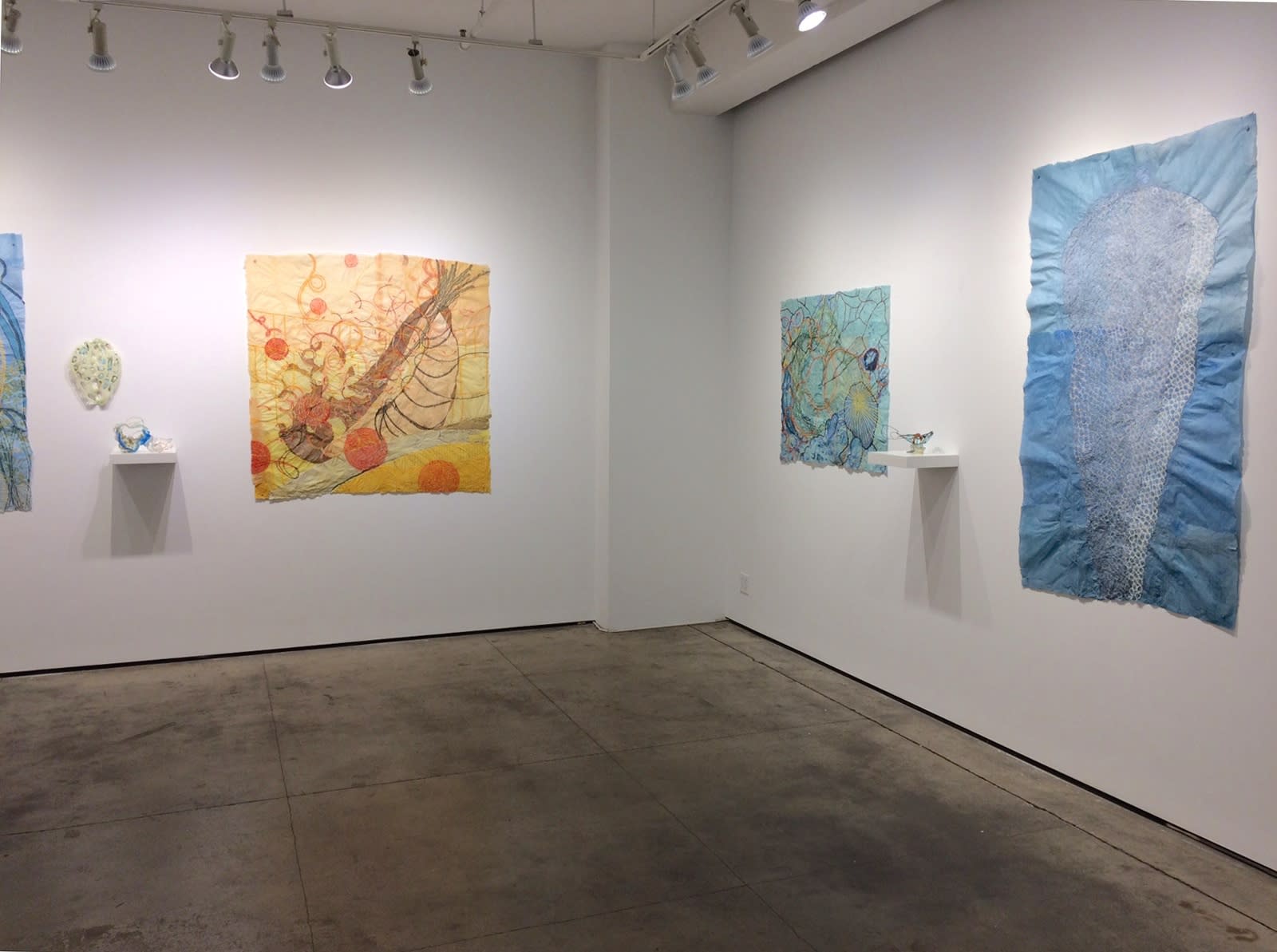 Installation shot of several different works by Nancy Cohen. 