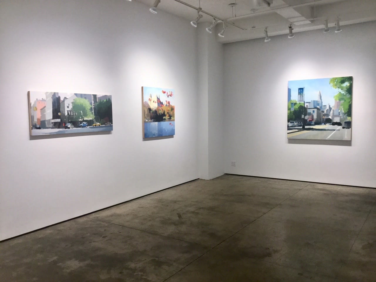 Installation shot of three paintings by Lisa Breslow. The paintings are done in oil and pencil on panel.