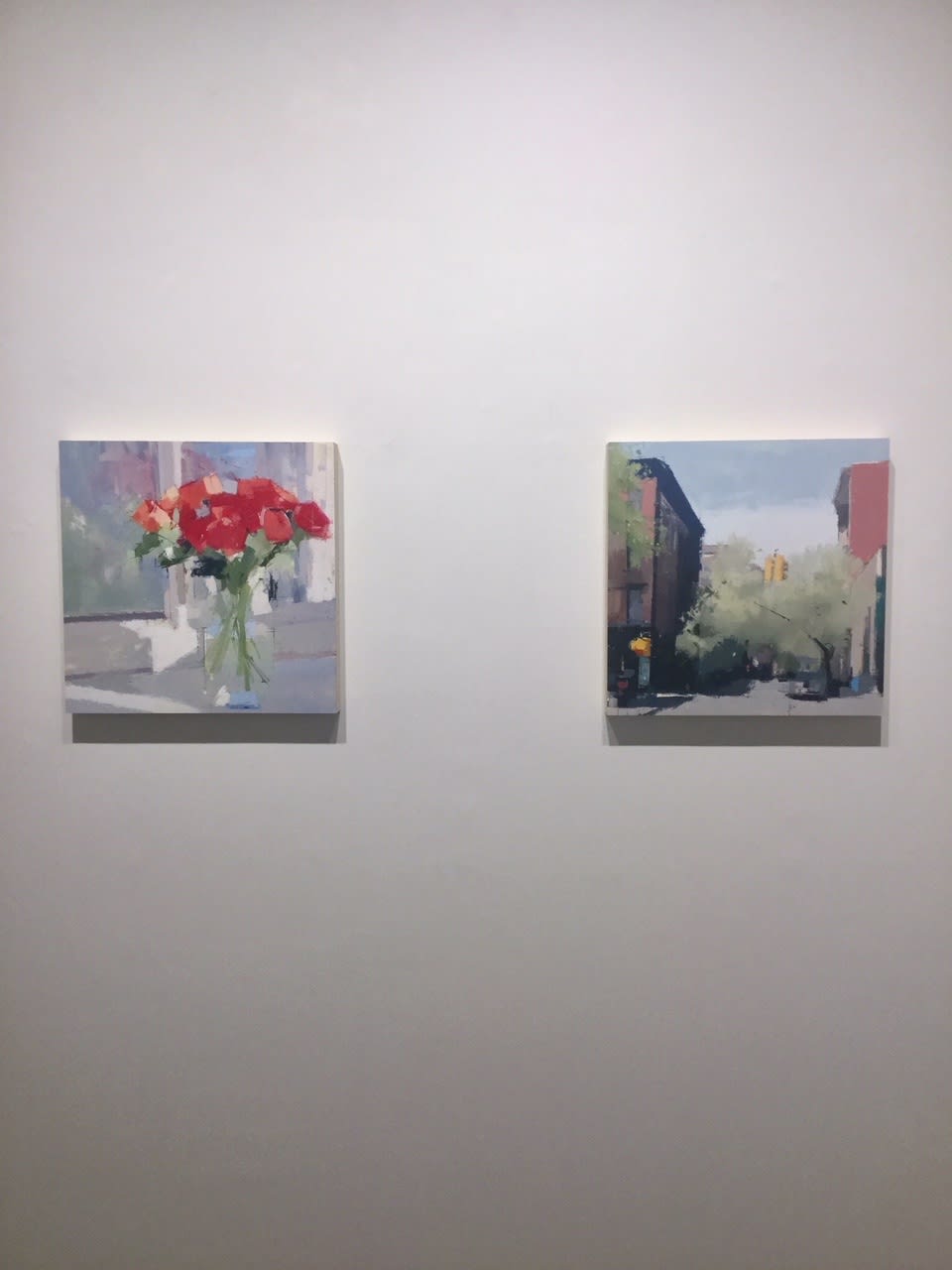 Installation shot of two paintings by Lisa Breslow done in oil and pencil on panel. 