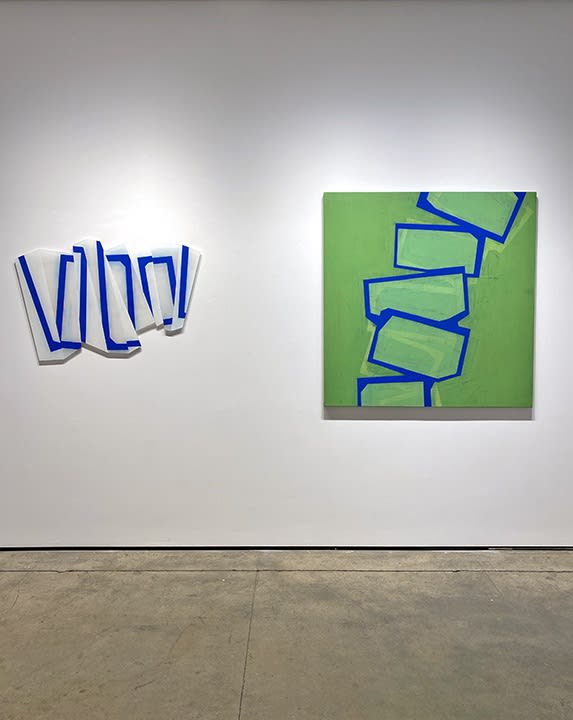 Steven Baris's Dys/Junctures k8 (left) next to his Toppling E1 (Right) hanging on the gallery wall 